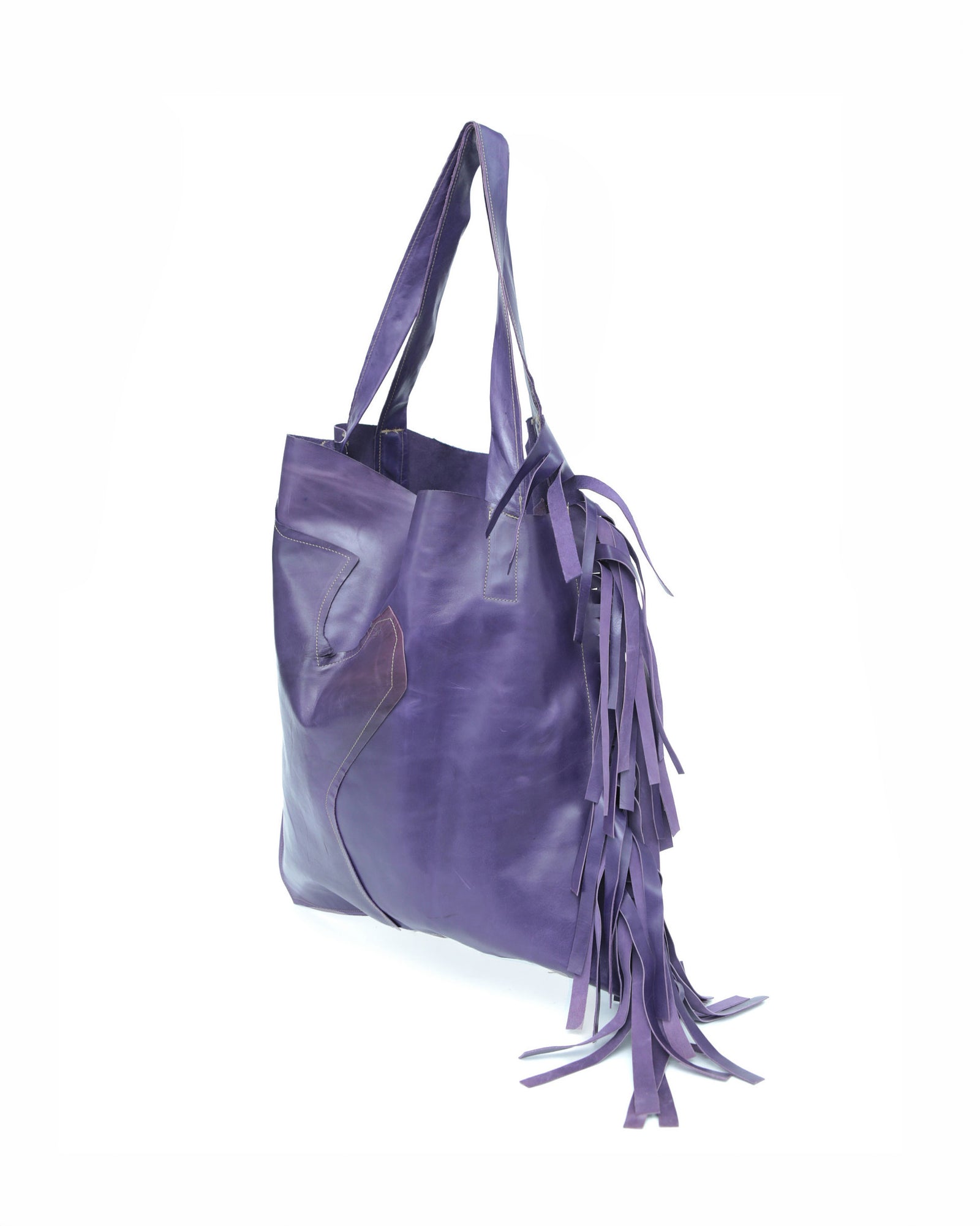 large violet leather tote bag with fringe detail