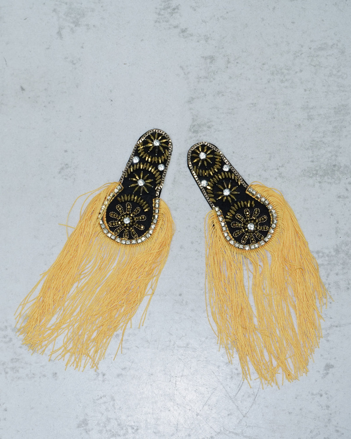 orange embellished fringed shoulder patches