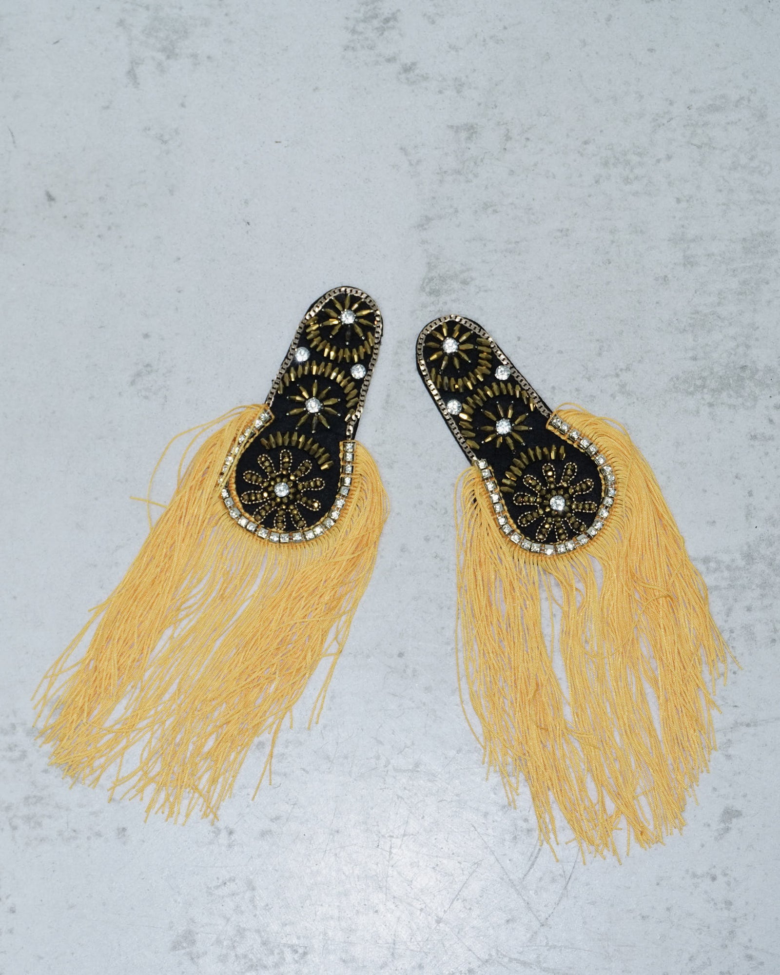 orange embellished fringed shoulder patches