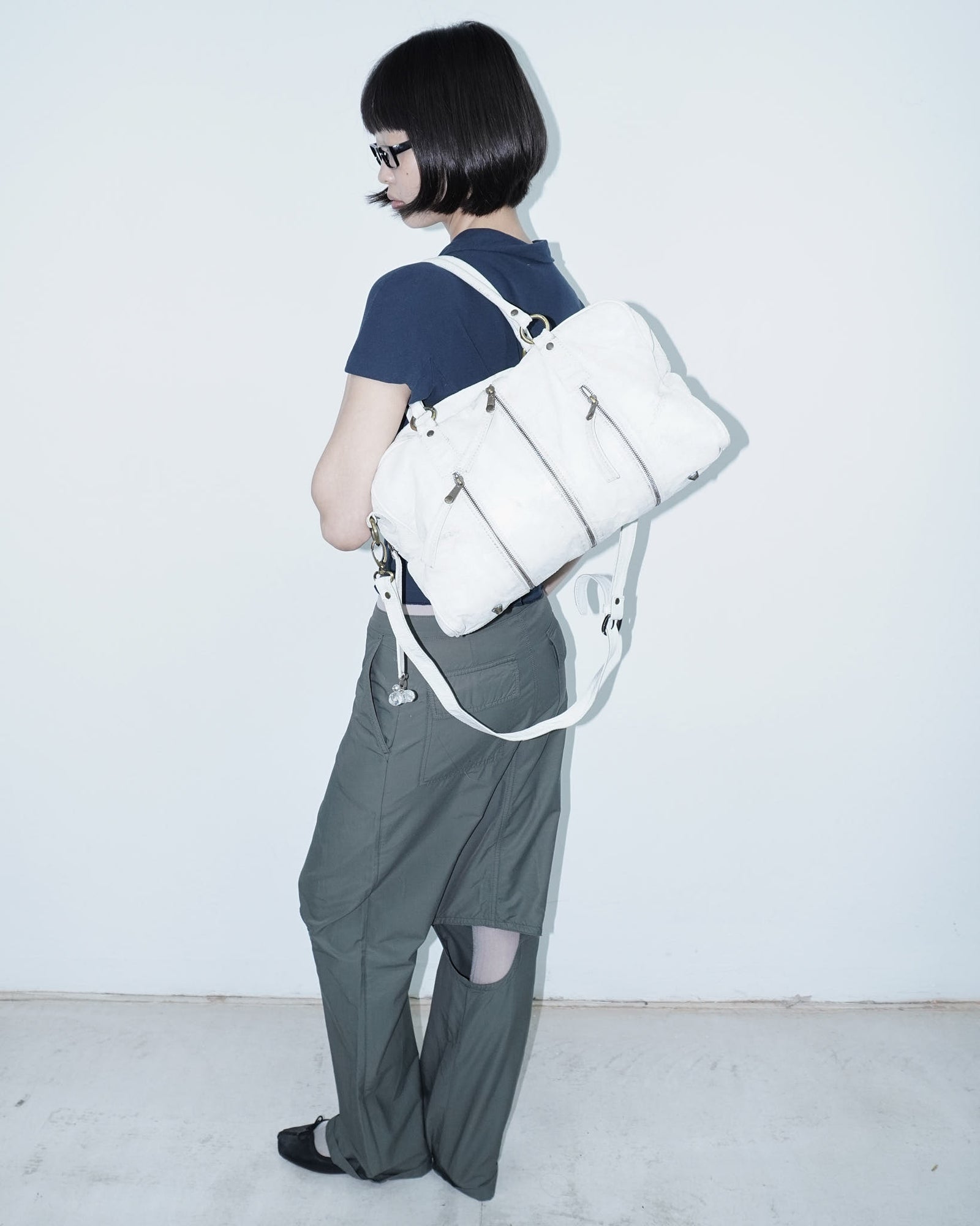 multi zipper distressed white leather bag