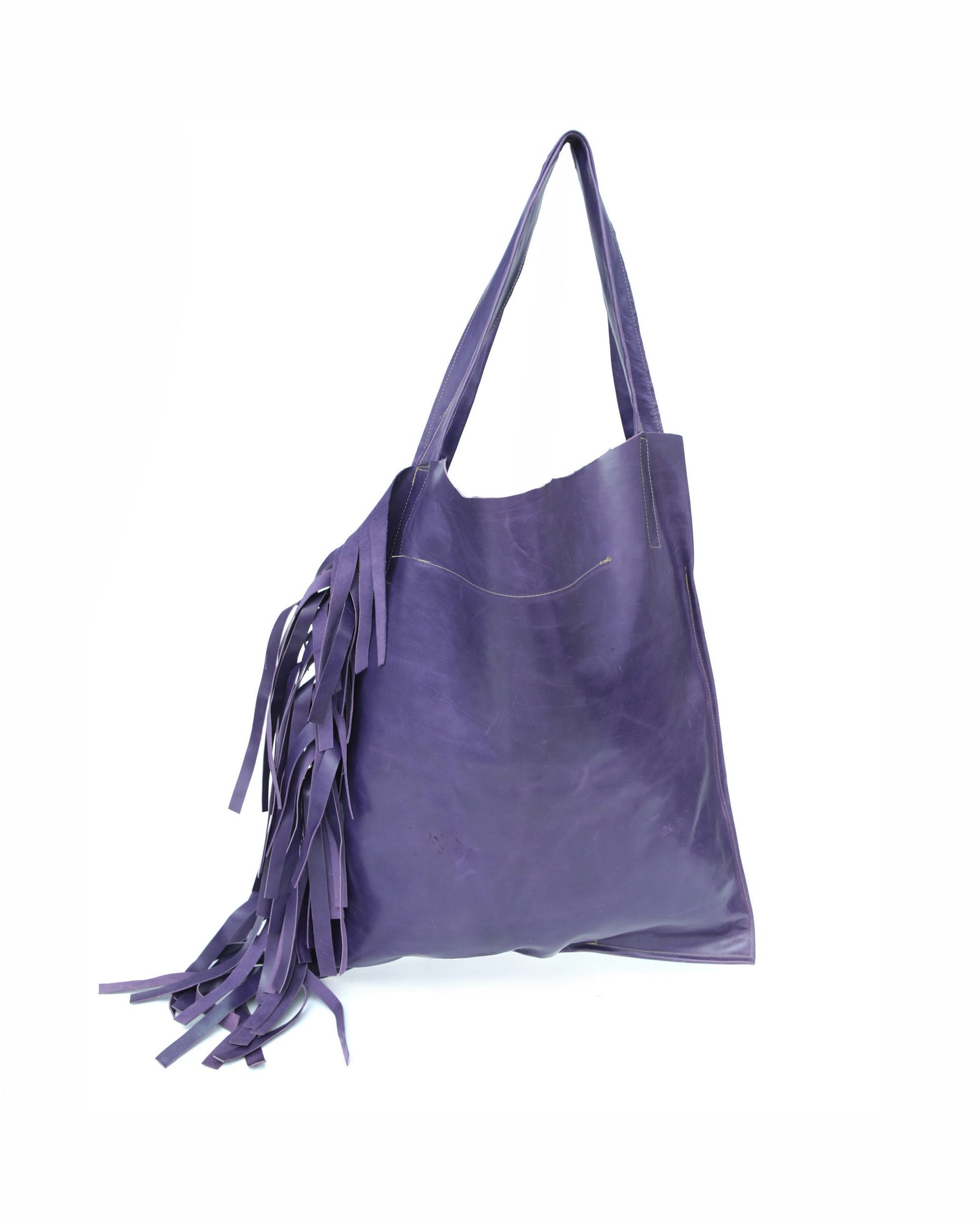 large violet leather tote bag with fringe detail