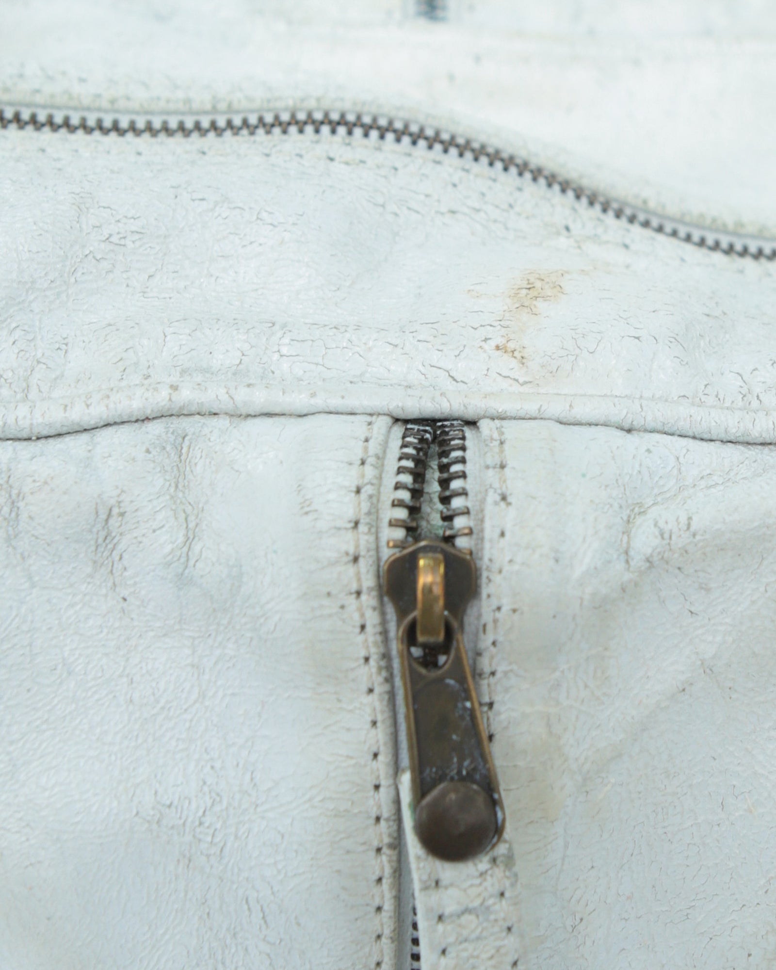 multi zipper distressed white leather bag