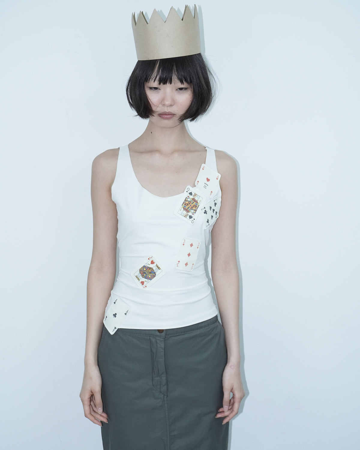 white top with poker cards
