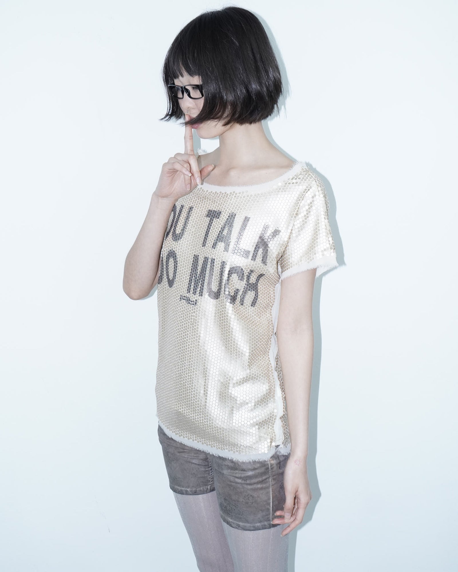 "you talk too much" gold sequin oversized tee
