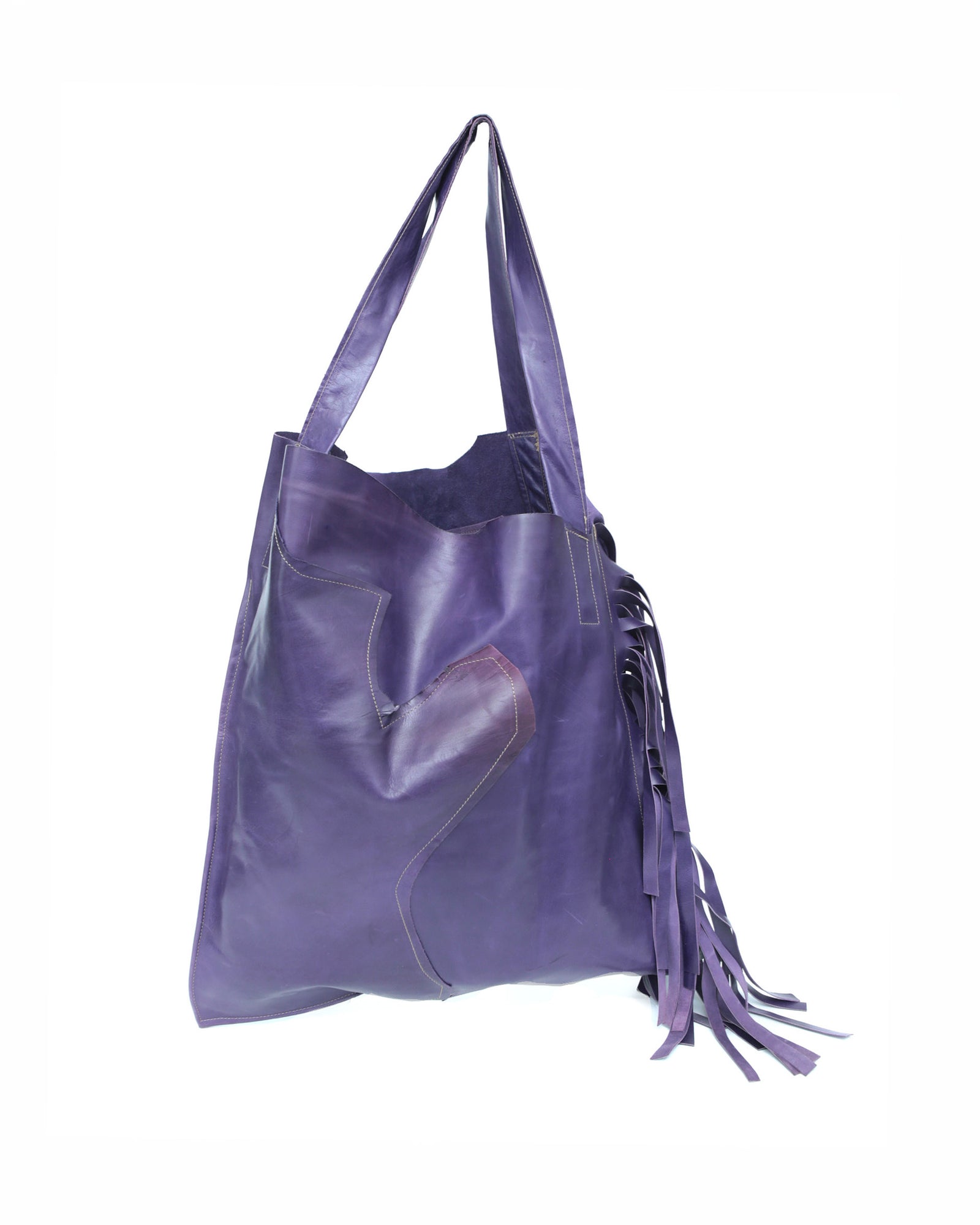 large violet leather tote bag with fringe detail