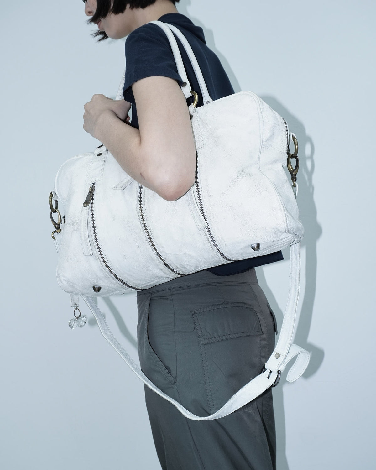 multi zipper distressed white leather bag