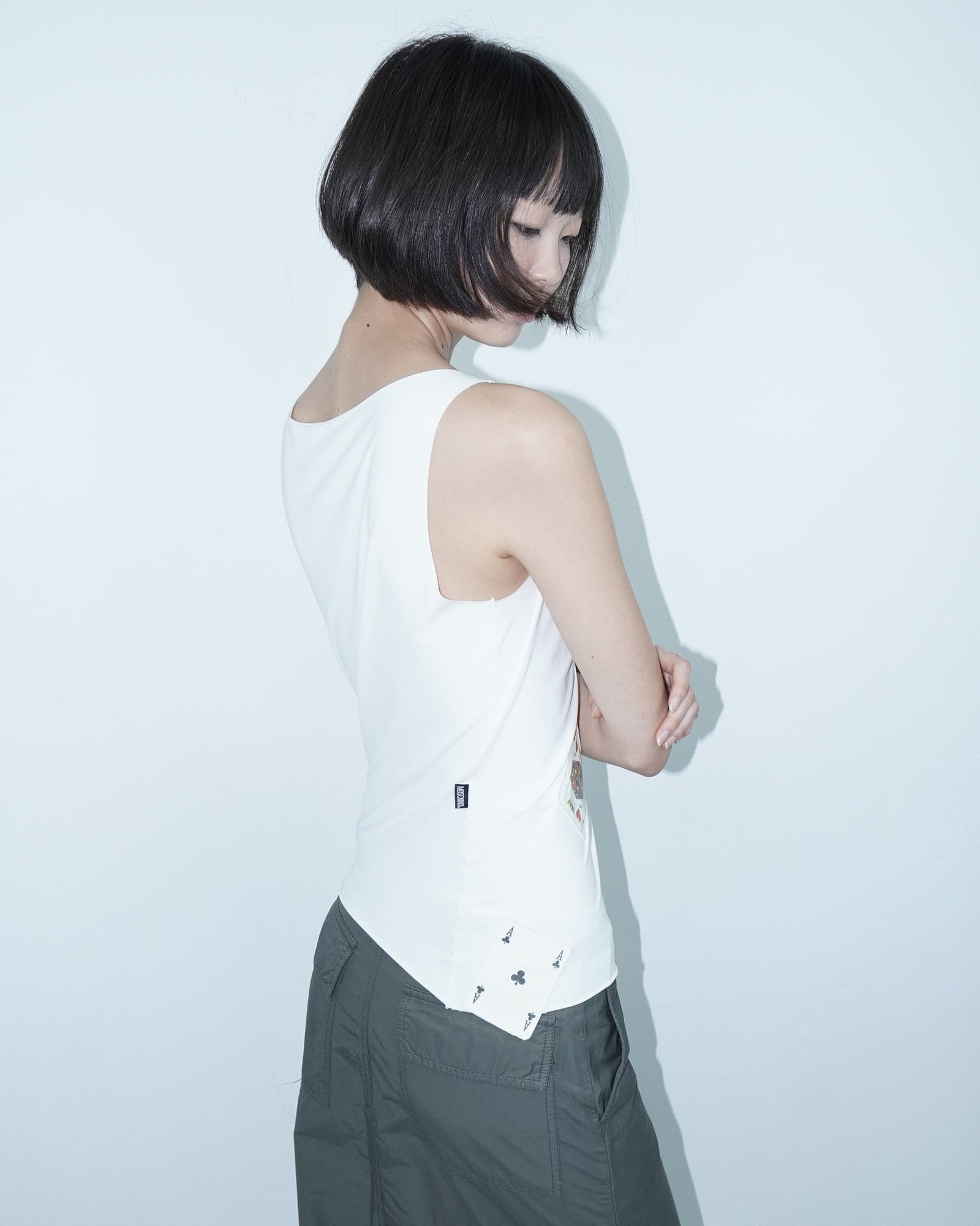white top with poker cards