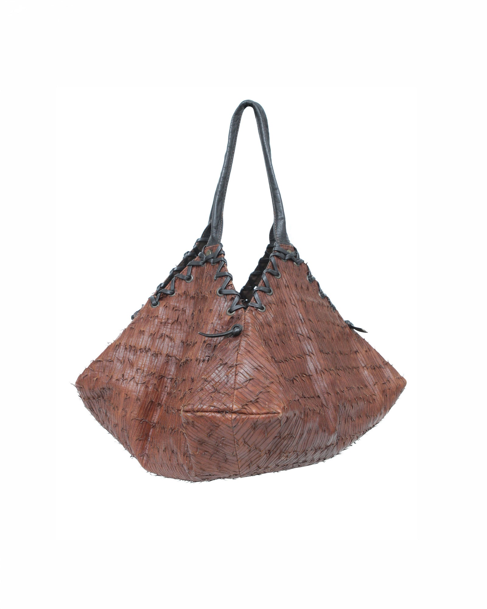 brown and black geometric textured leather bag