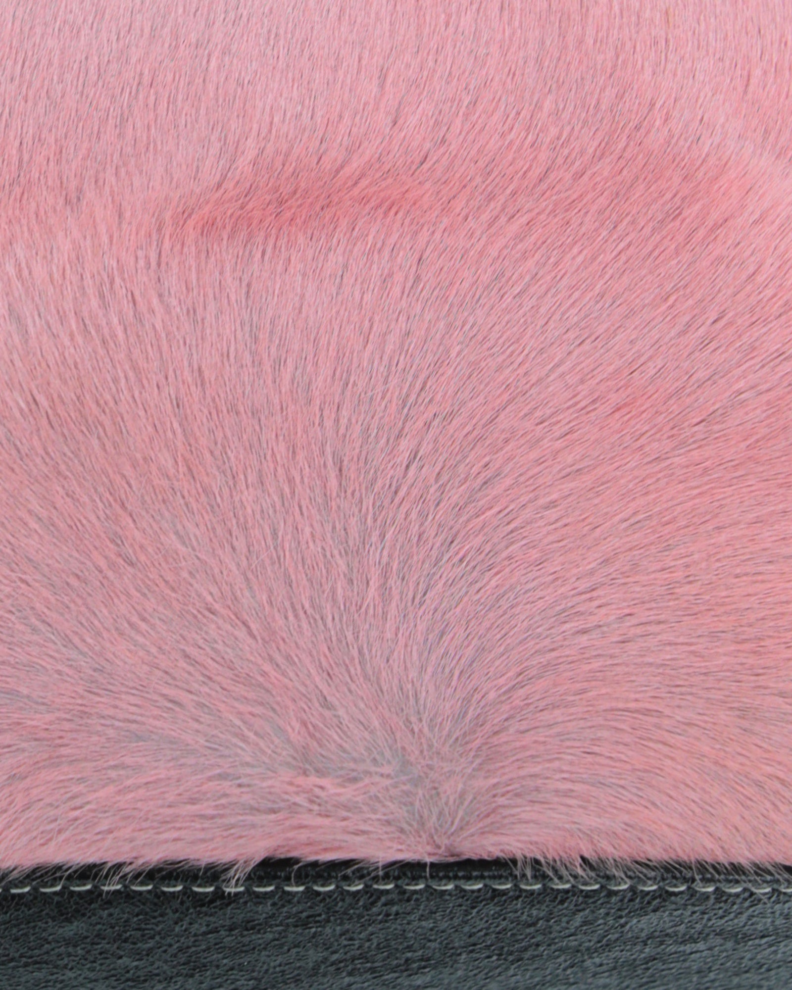 pink pony hair and black shiny leather bag