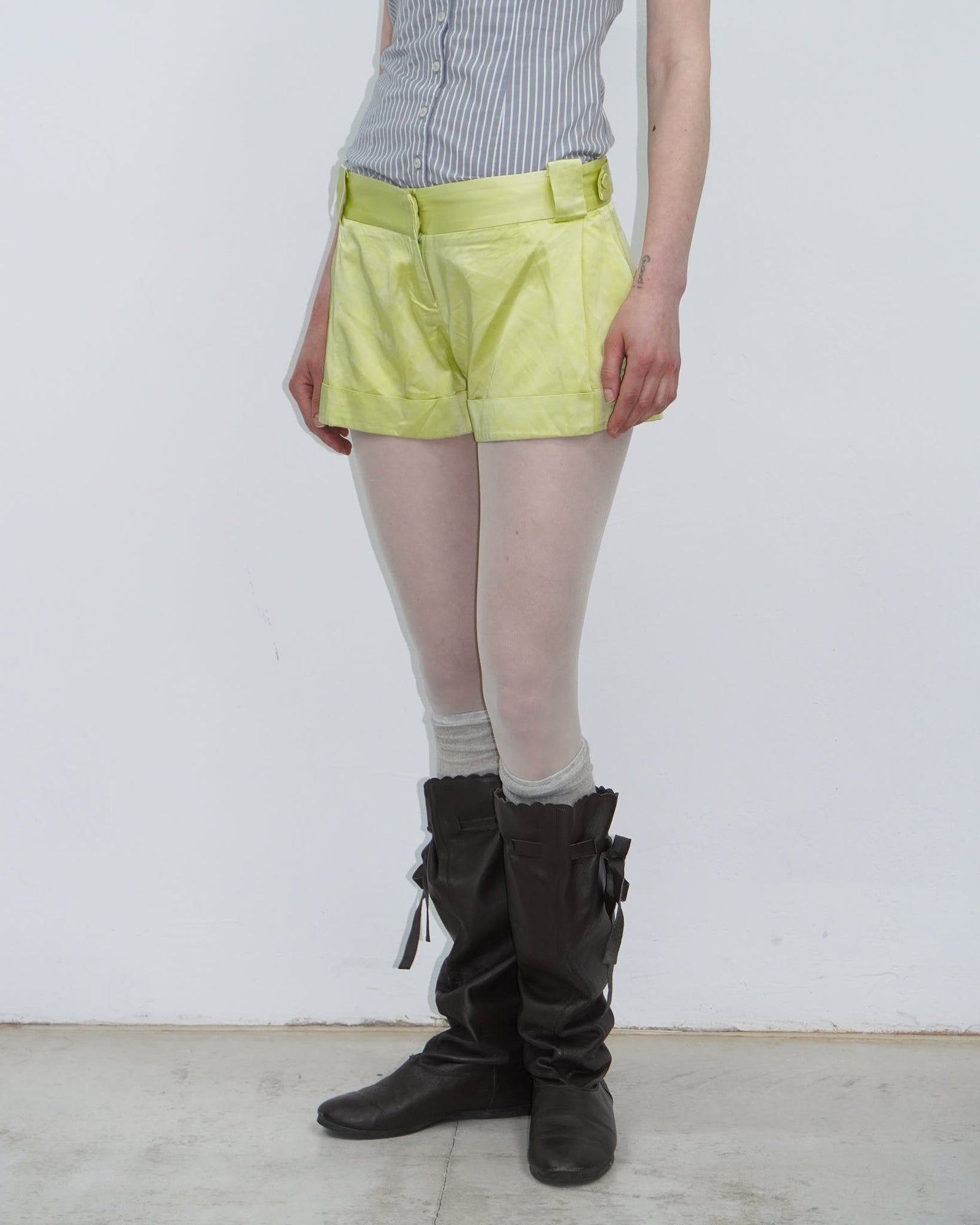 acid yellow satin mini shorts