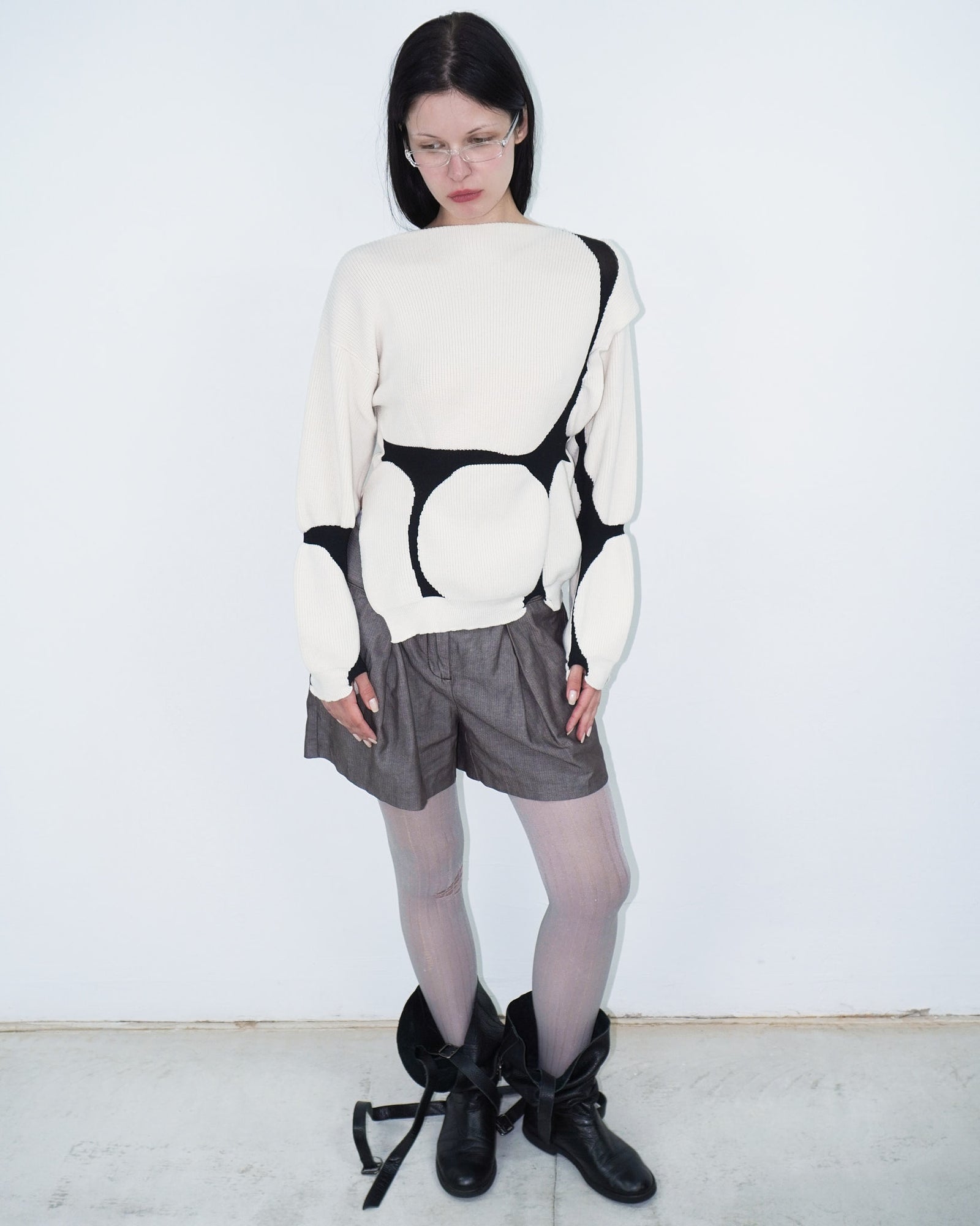 asymmetrical virgin wool sweater with puffed cuffs