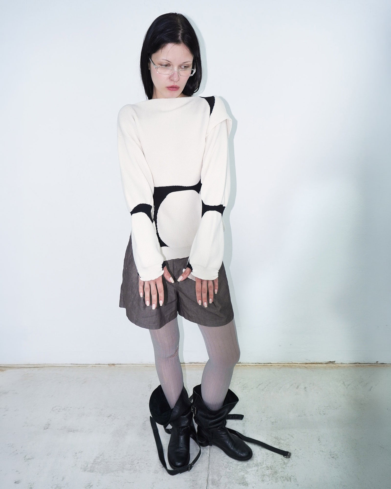 asymmetrical virgin wool sweater with puffed cuffs