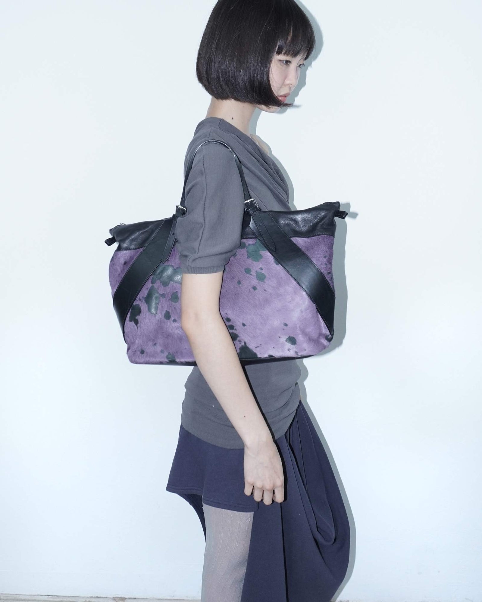 big purple and black pony hair bag