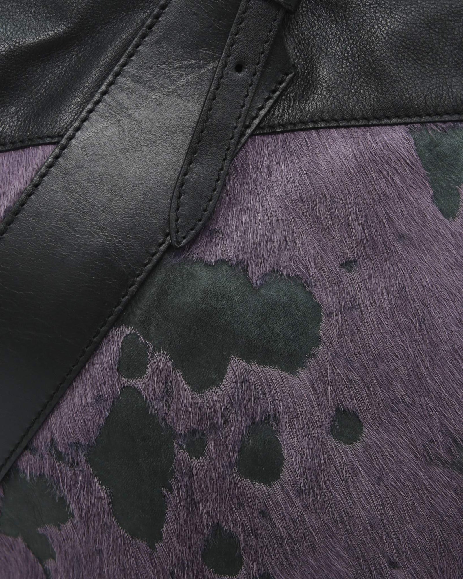 big purple and black pony hair bag