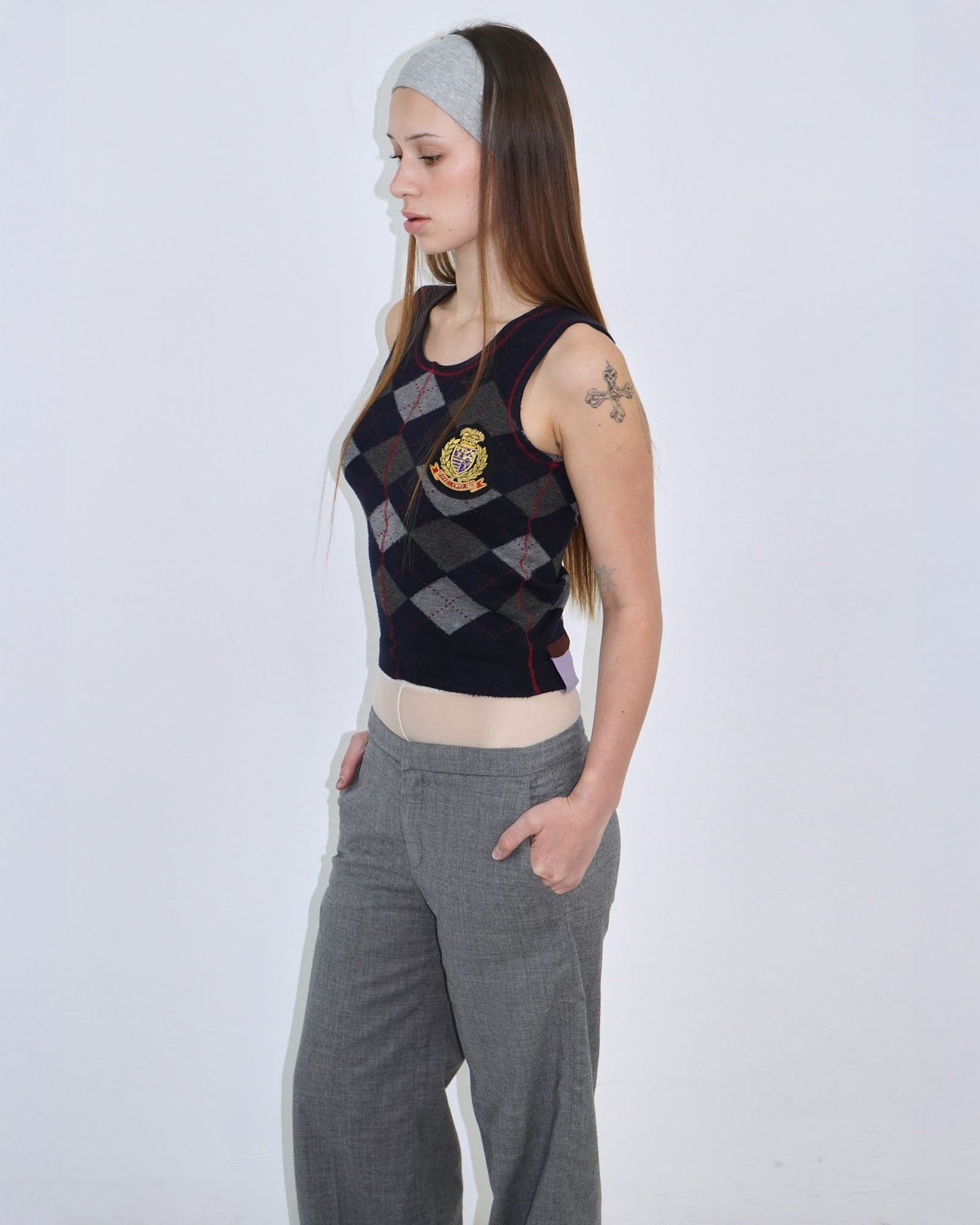 dark blue argyle plunder-style knit top