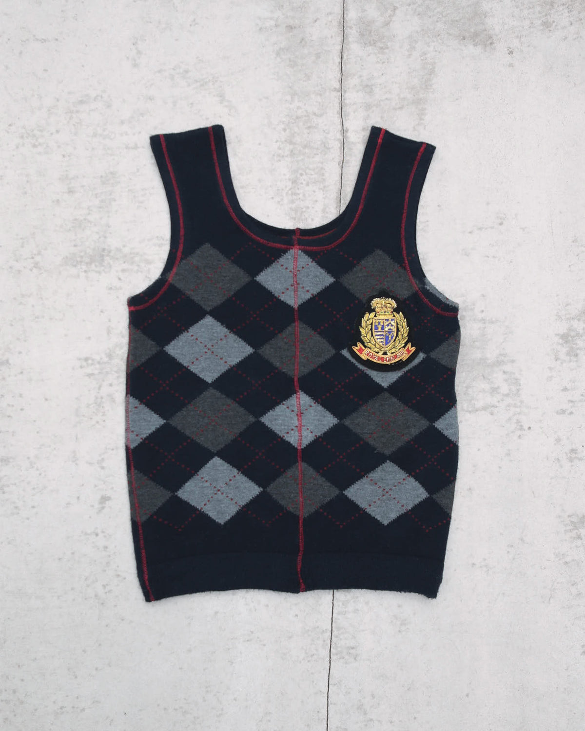 dark blue argyle plunder-style knit top