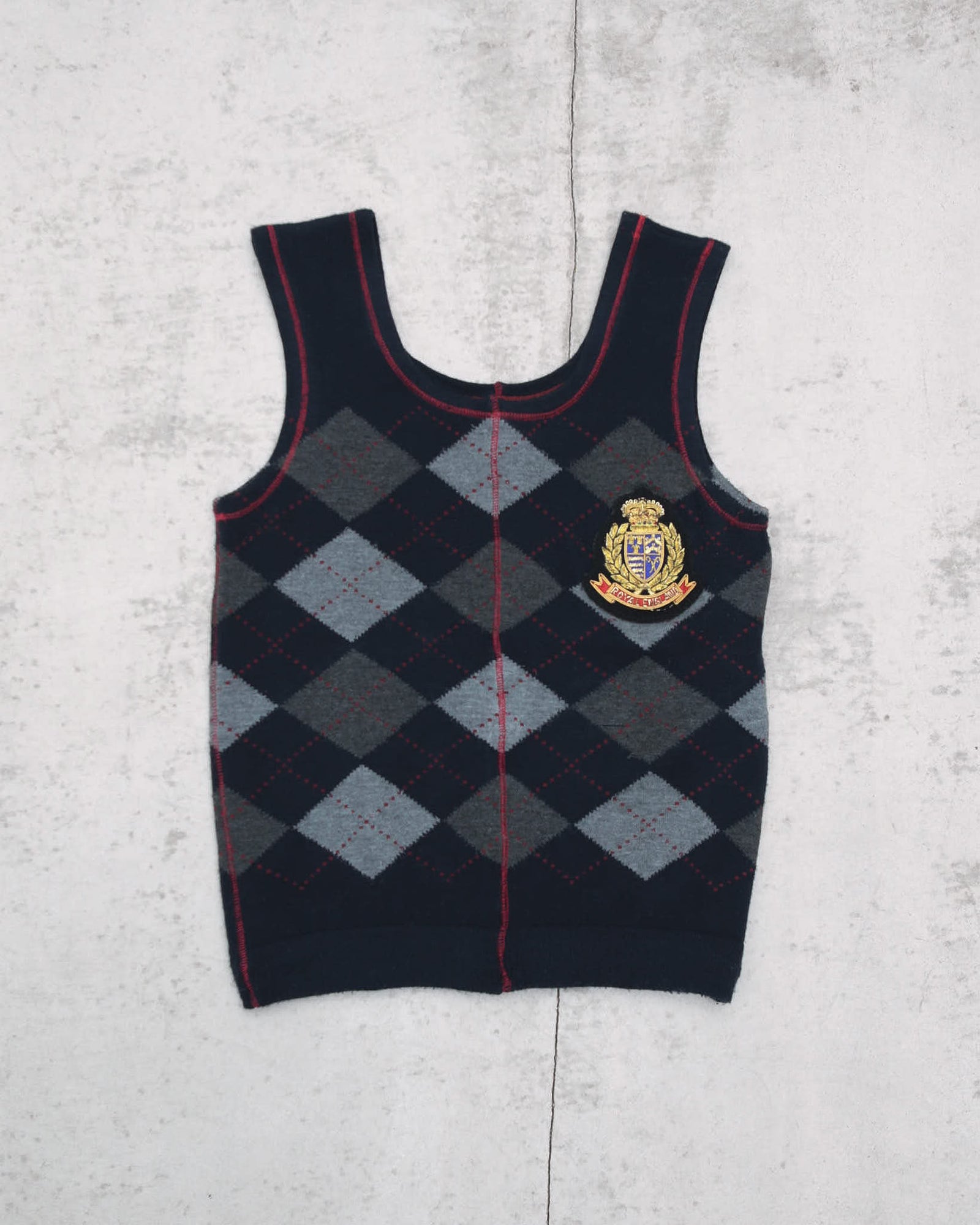 dark blue argyle plunder-style knit top