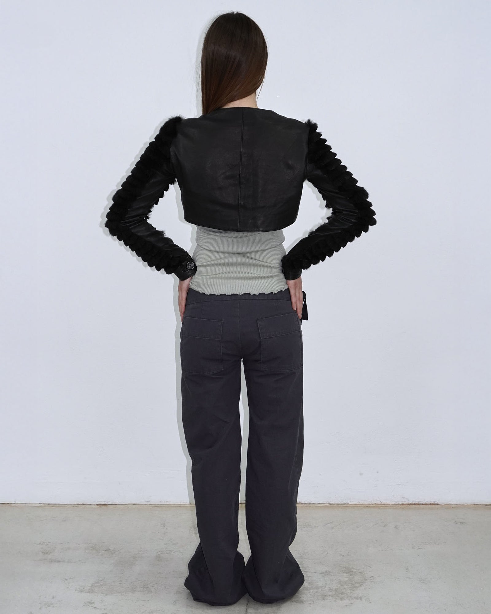 black leather bolero with fur arms