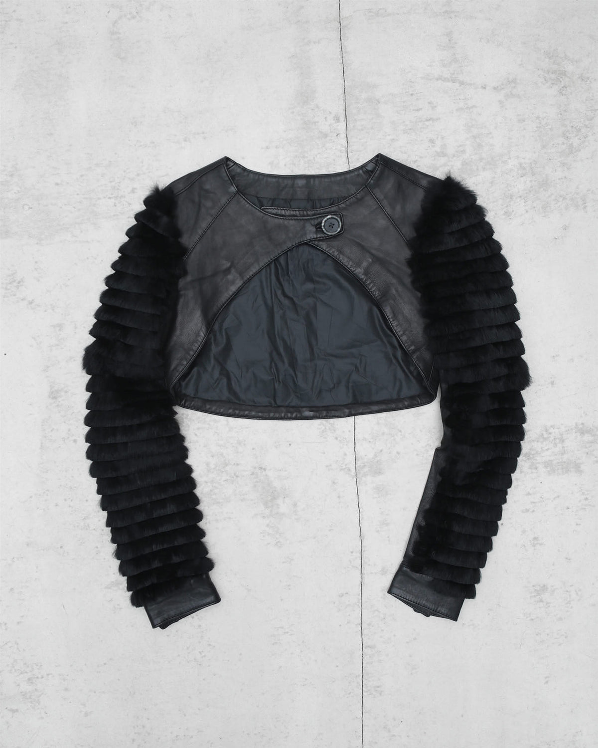 black leather bolero with fur arms