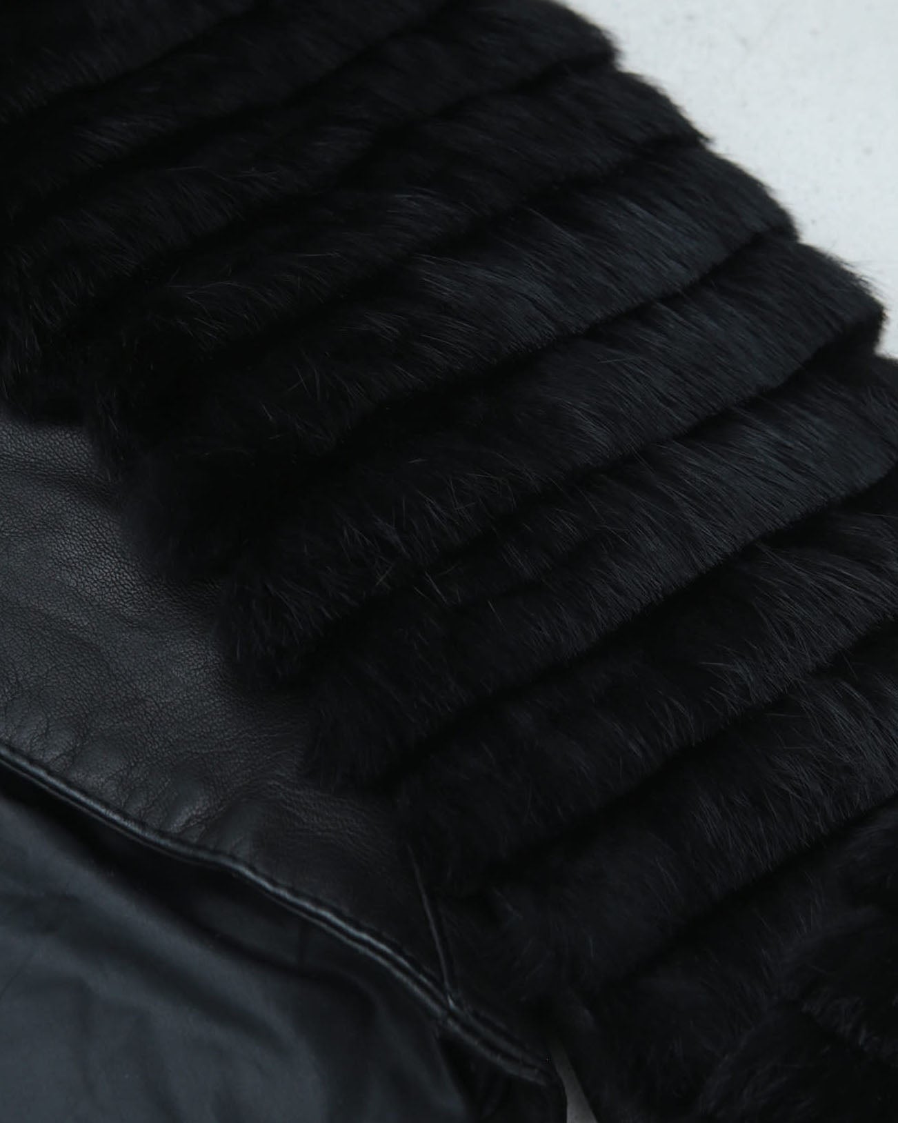 black leather bolero with fur arms