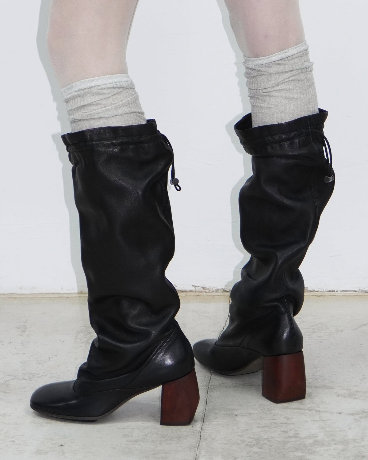 black leather slouchy boots with block heel