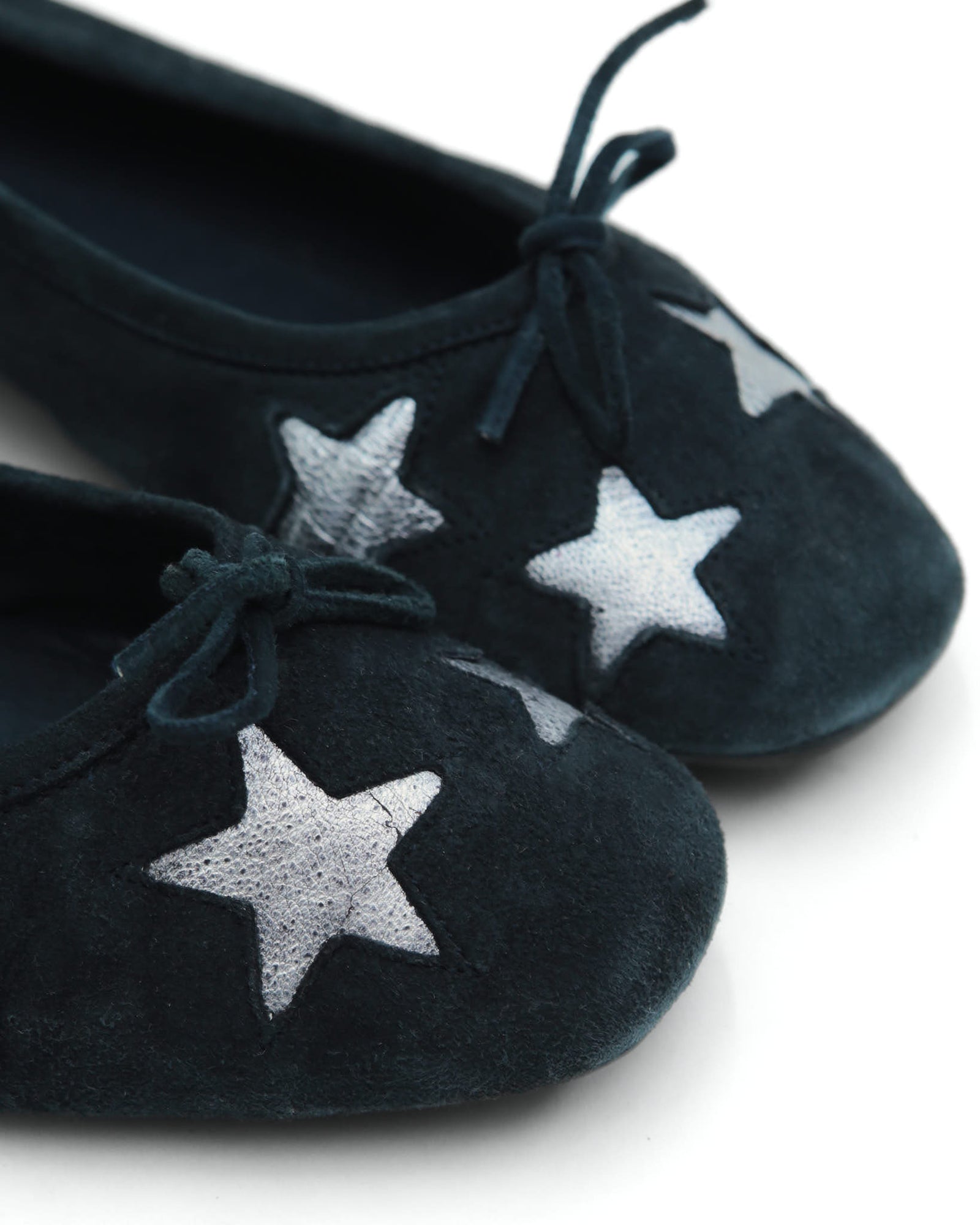black star ballet flats