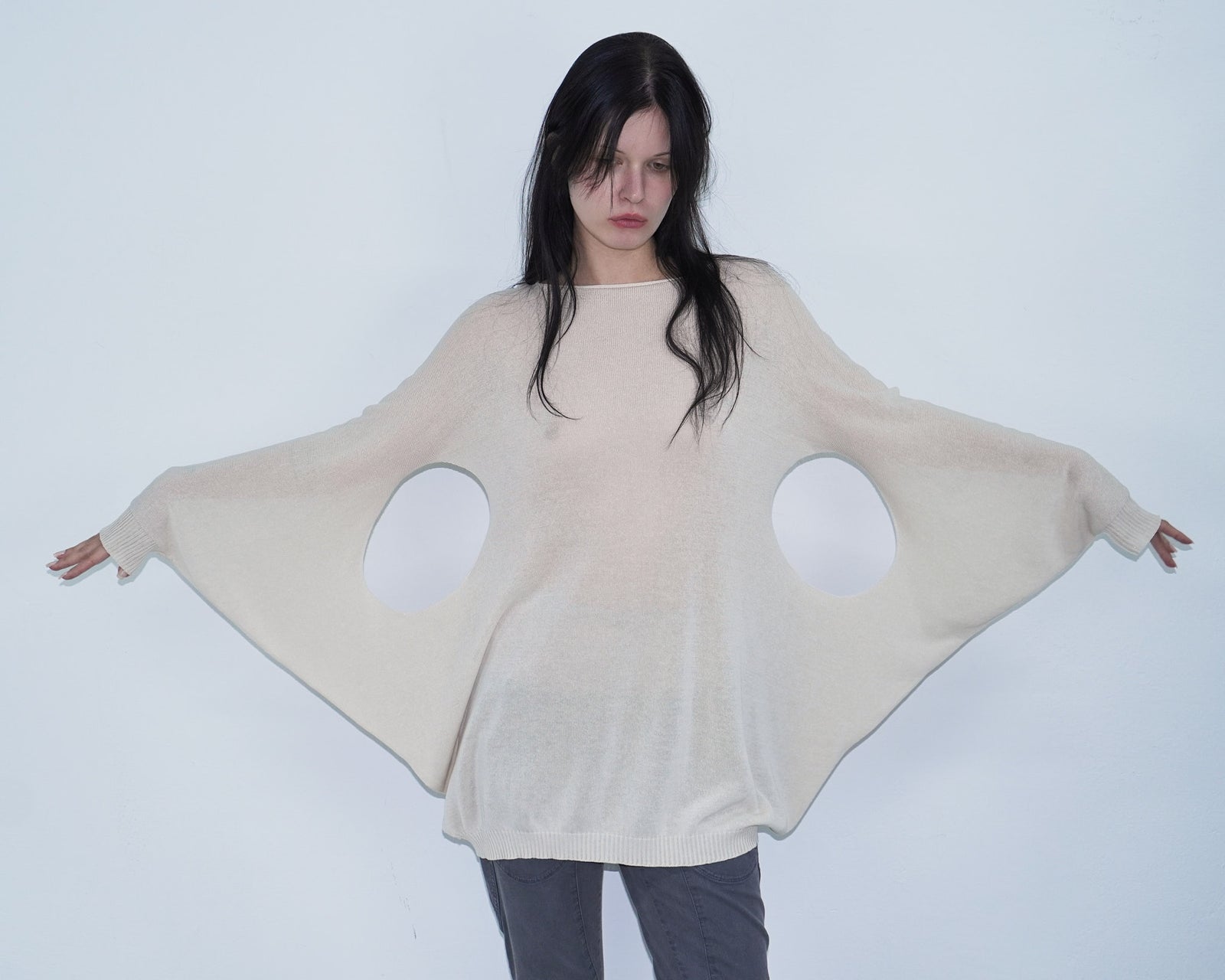 cream knit top with cut out details