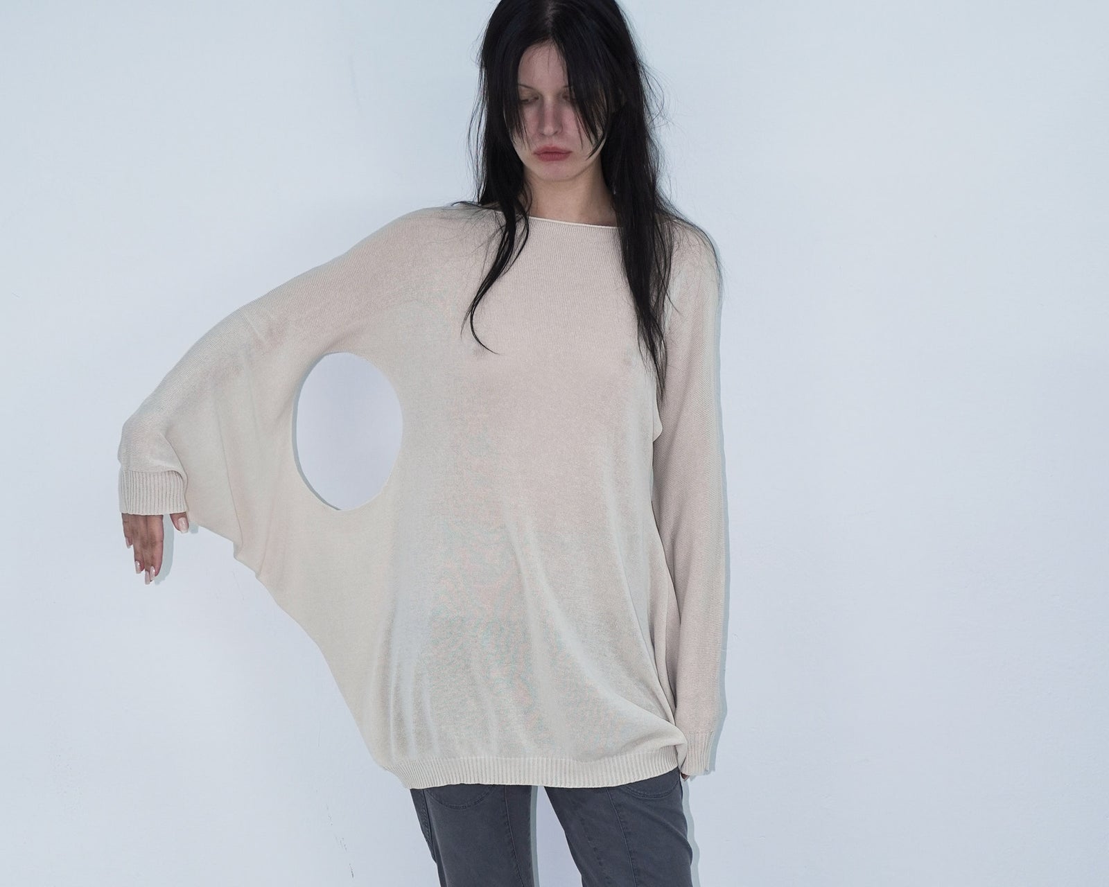 cream knit top with cut out details