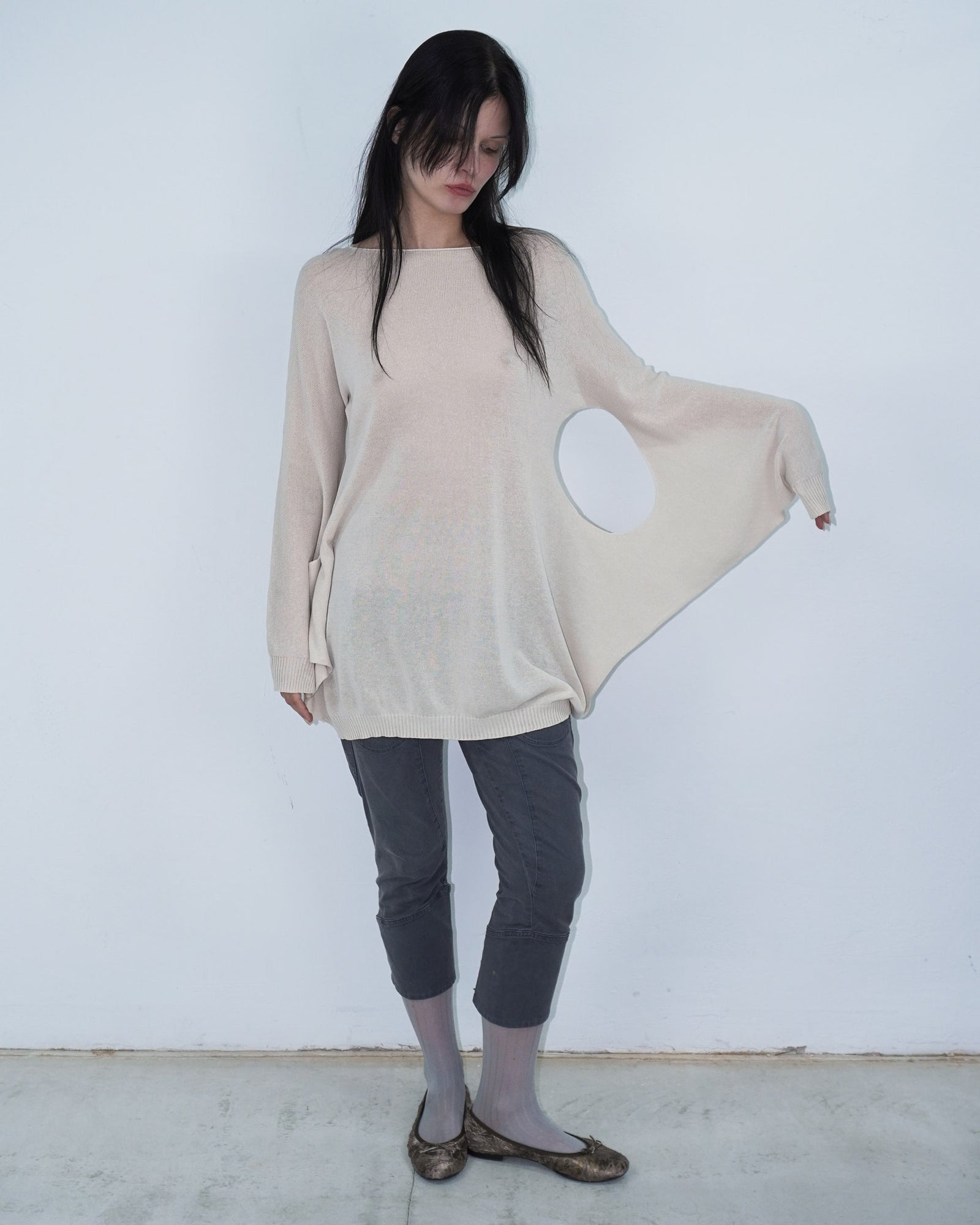cream knit top with cut out details