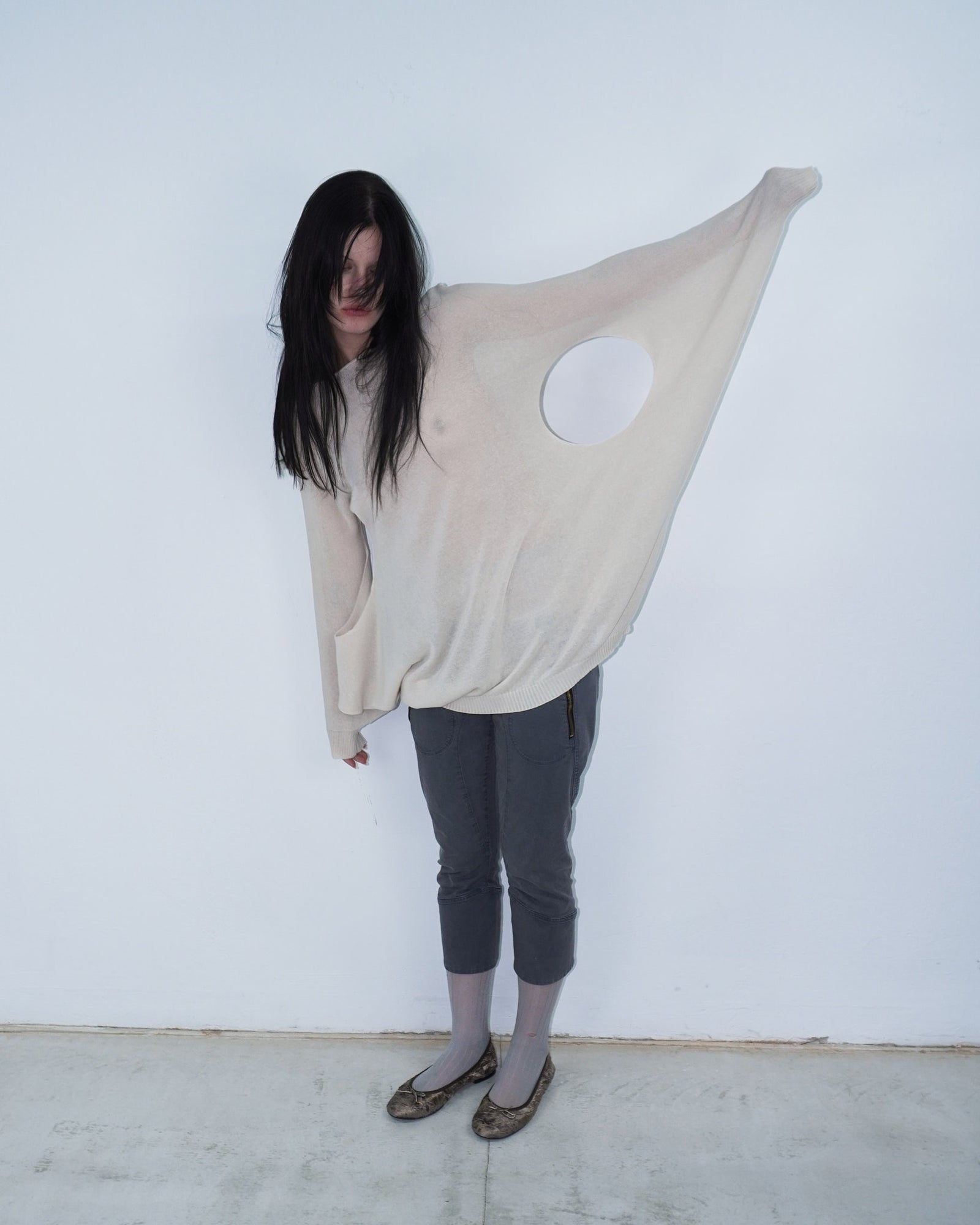 cream knit top with cut out details