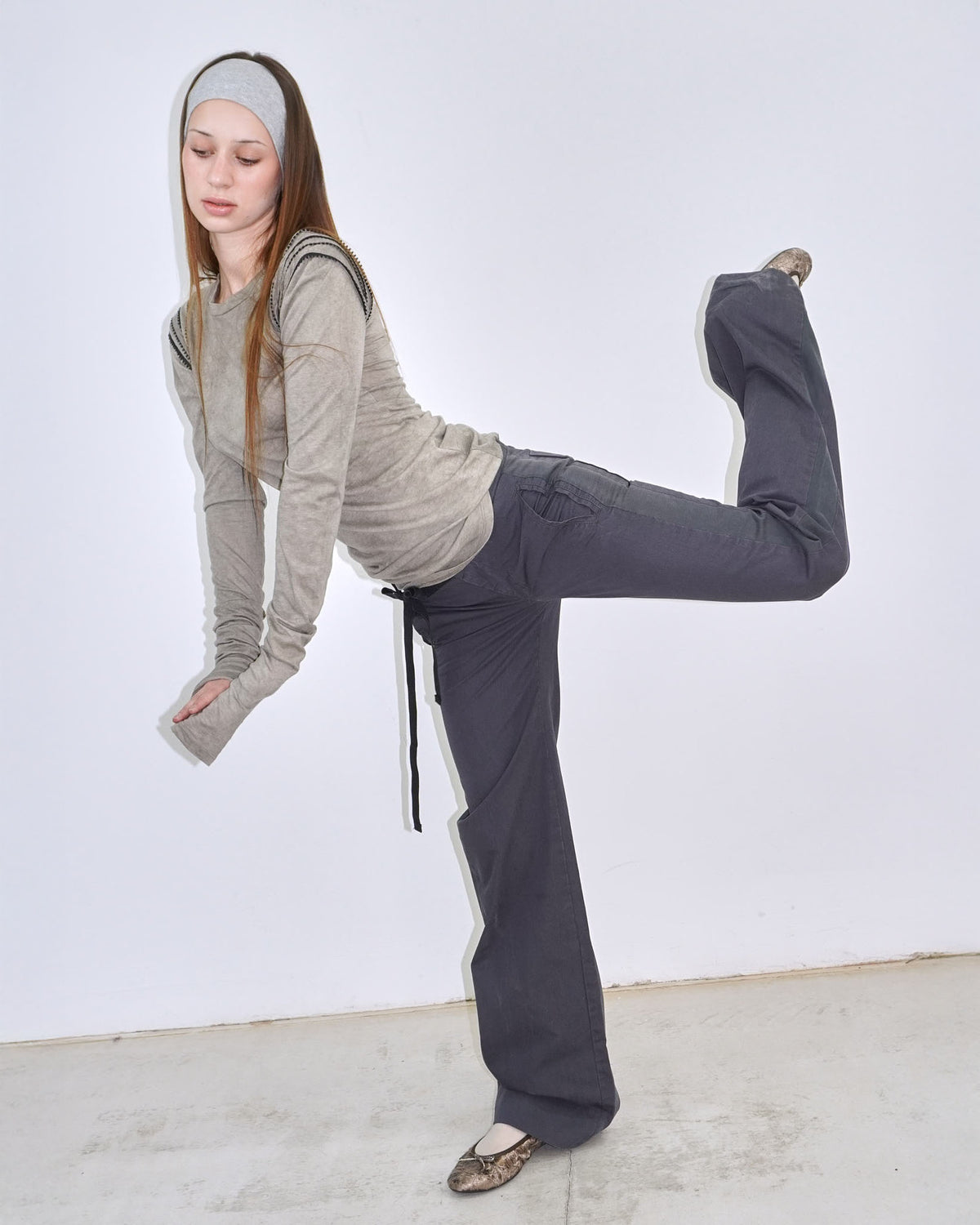 dark navy asymmetrical string belted pants