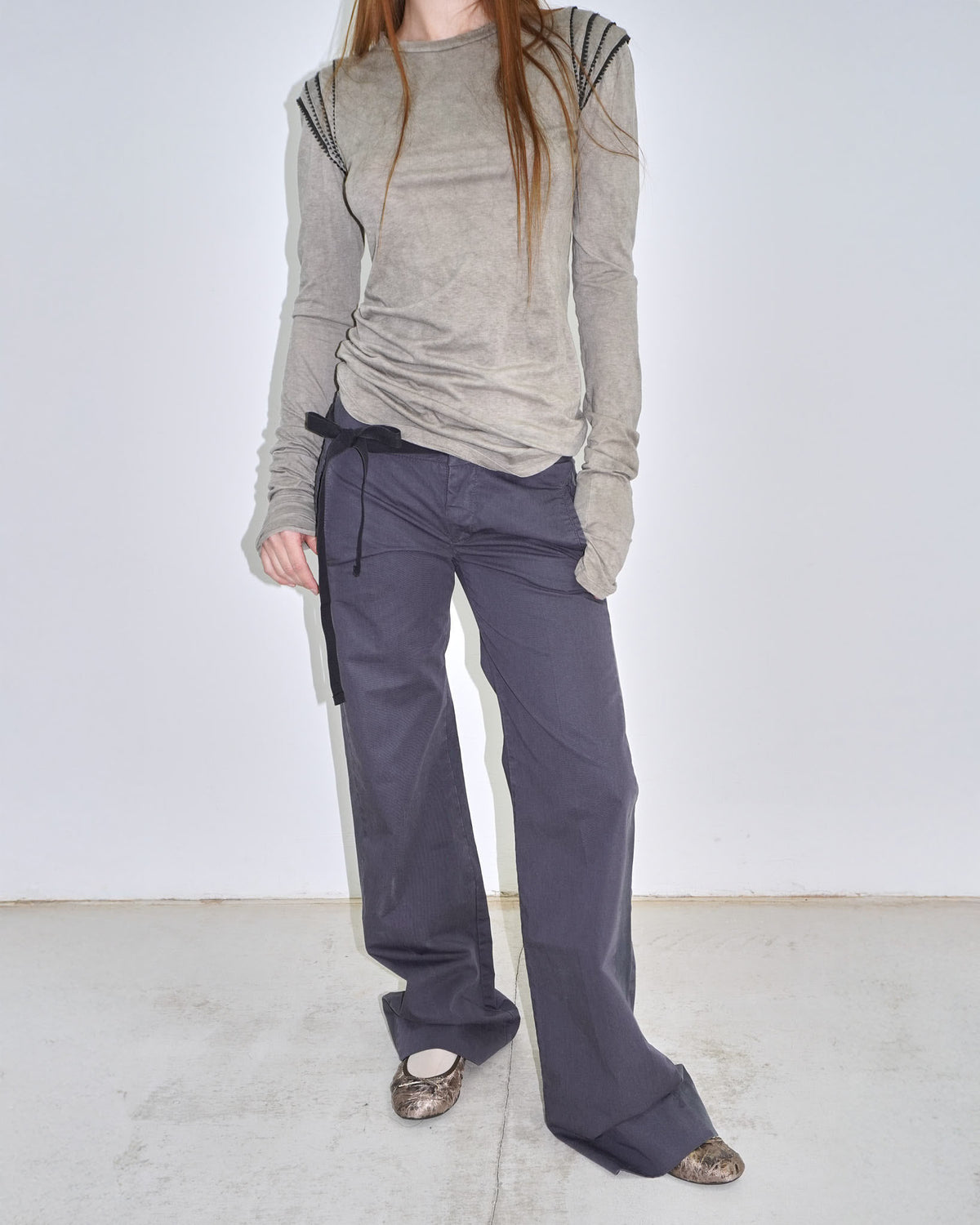 dark navy asymmetrical string belted pants