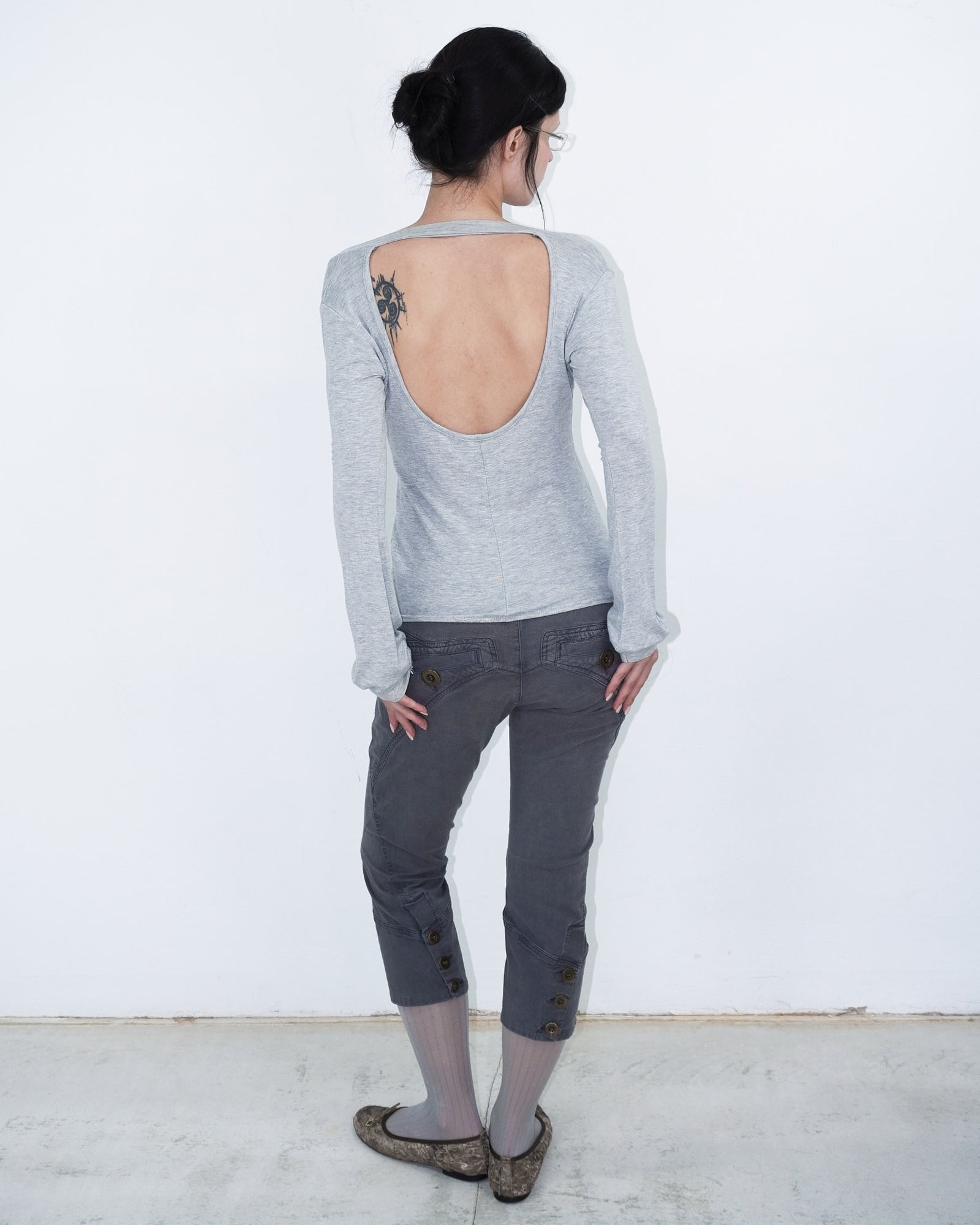 deep V-neck long sleeve top with open back