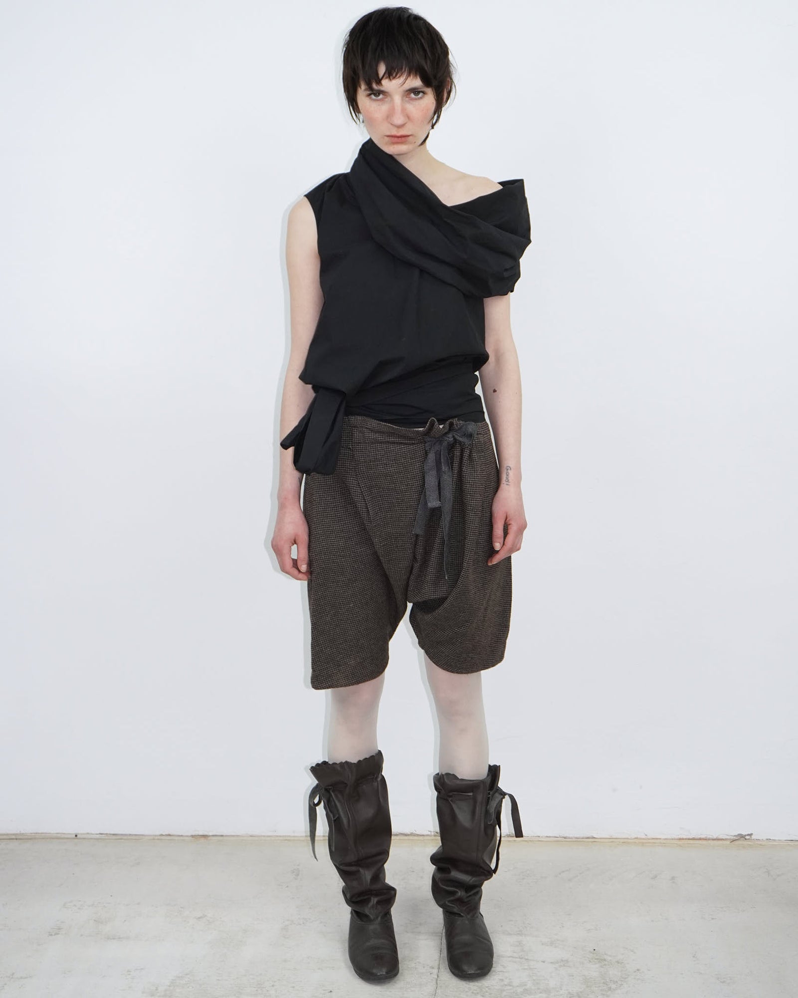 elegant black top with statement neckline