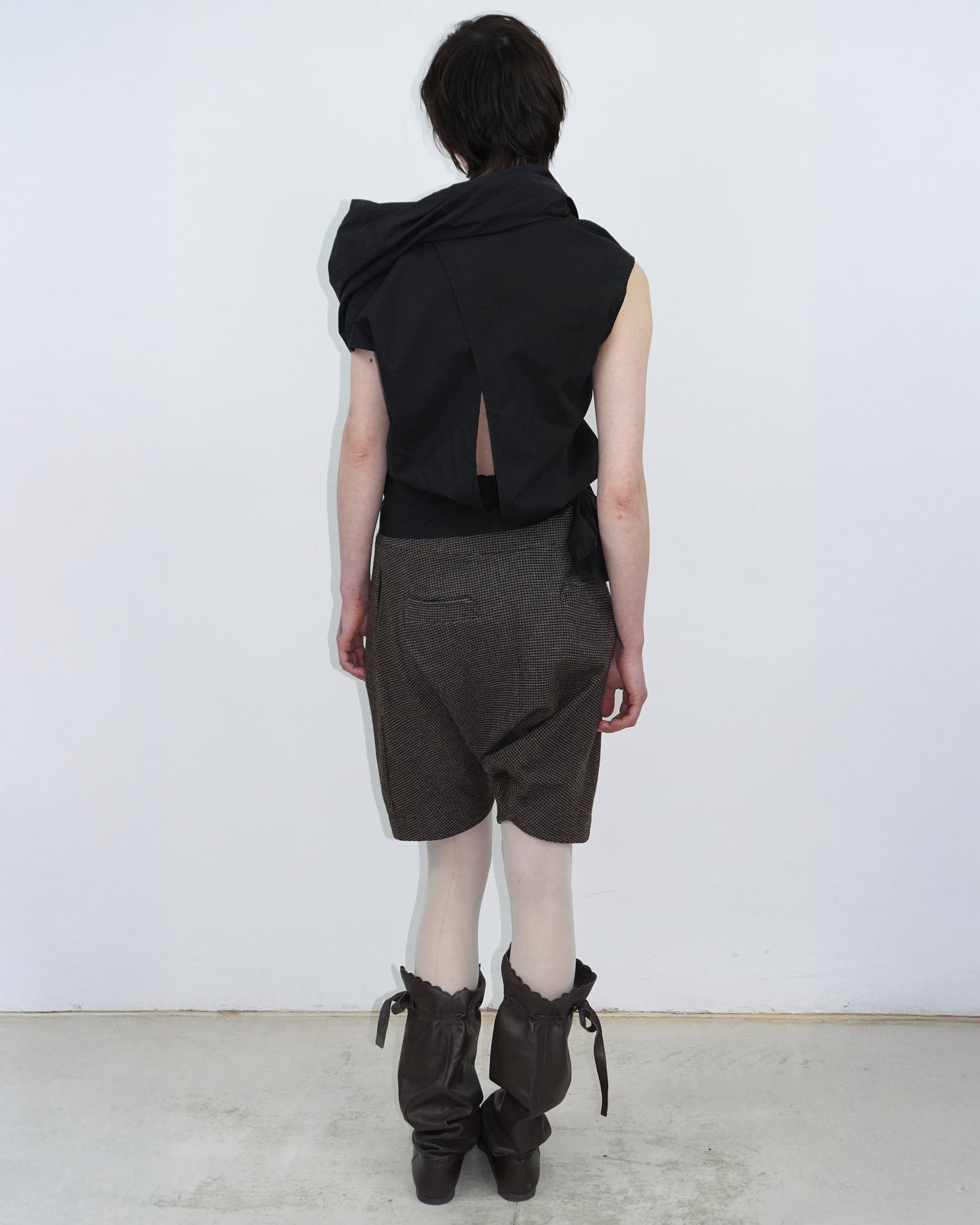 elegant black top with statement neckline
