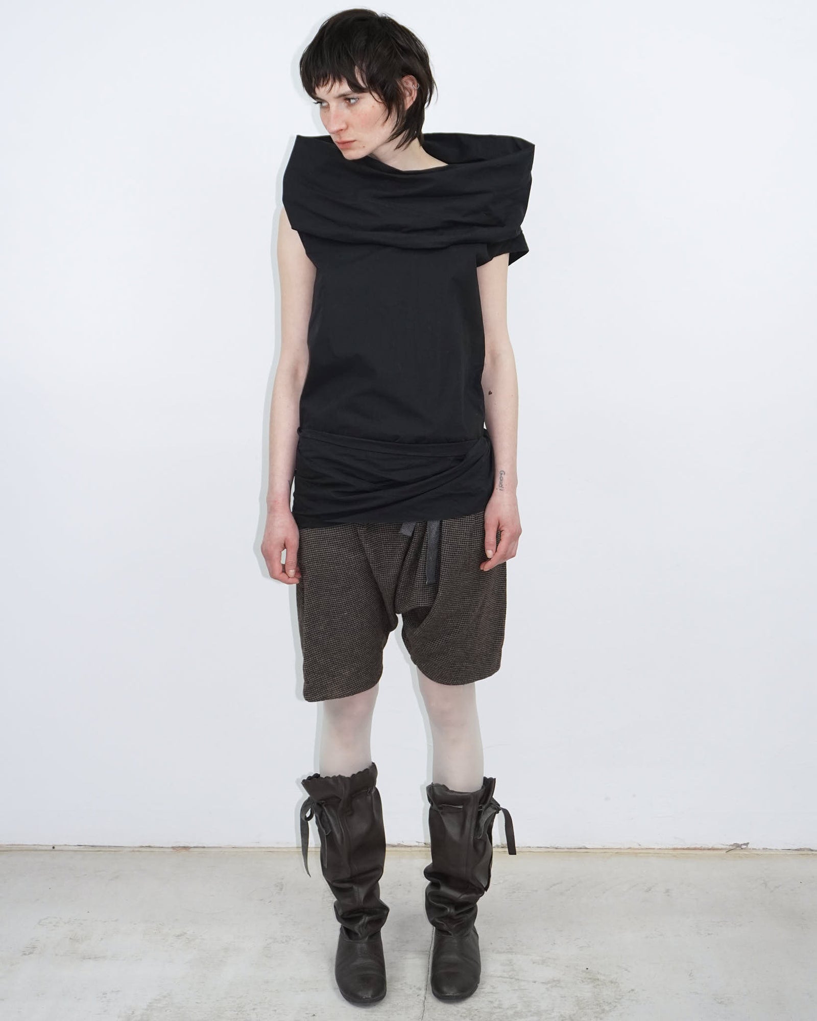 elegant black top with statement neckline