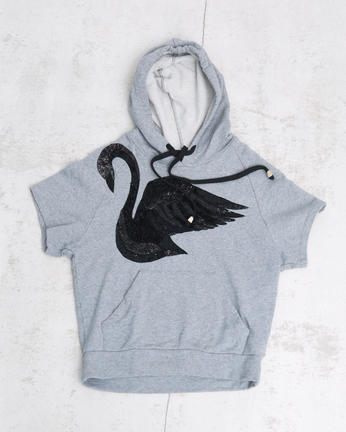 grey hooded top with sequin swan
