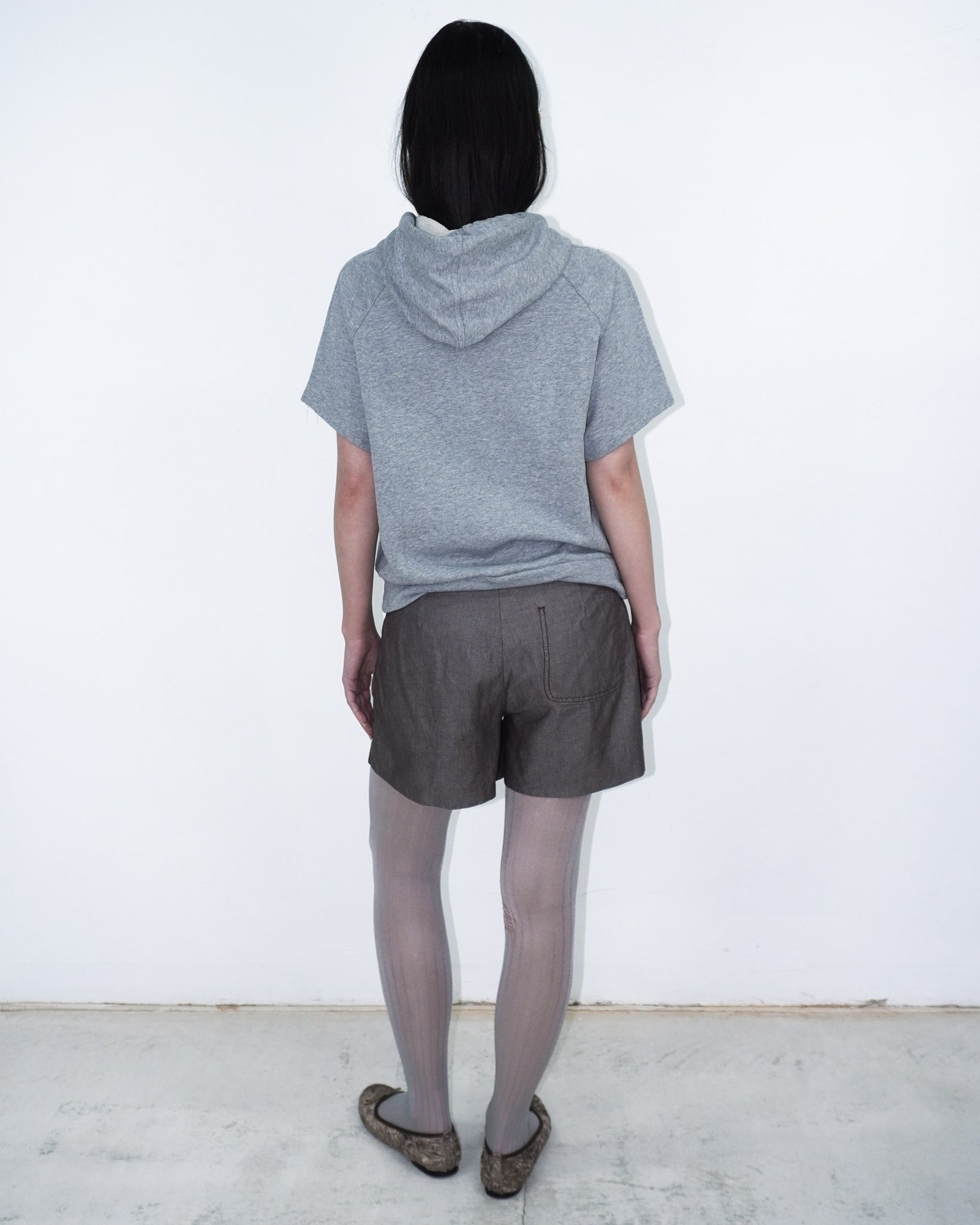 grey hooded top with sequin swan