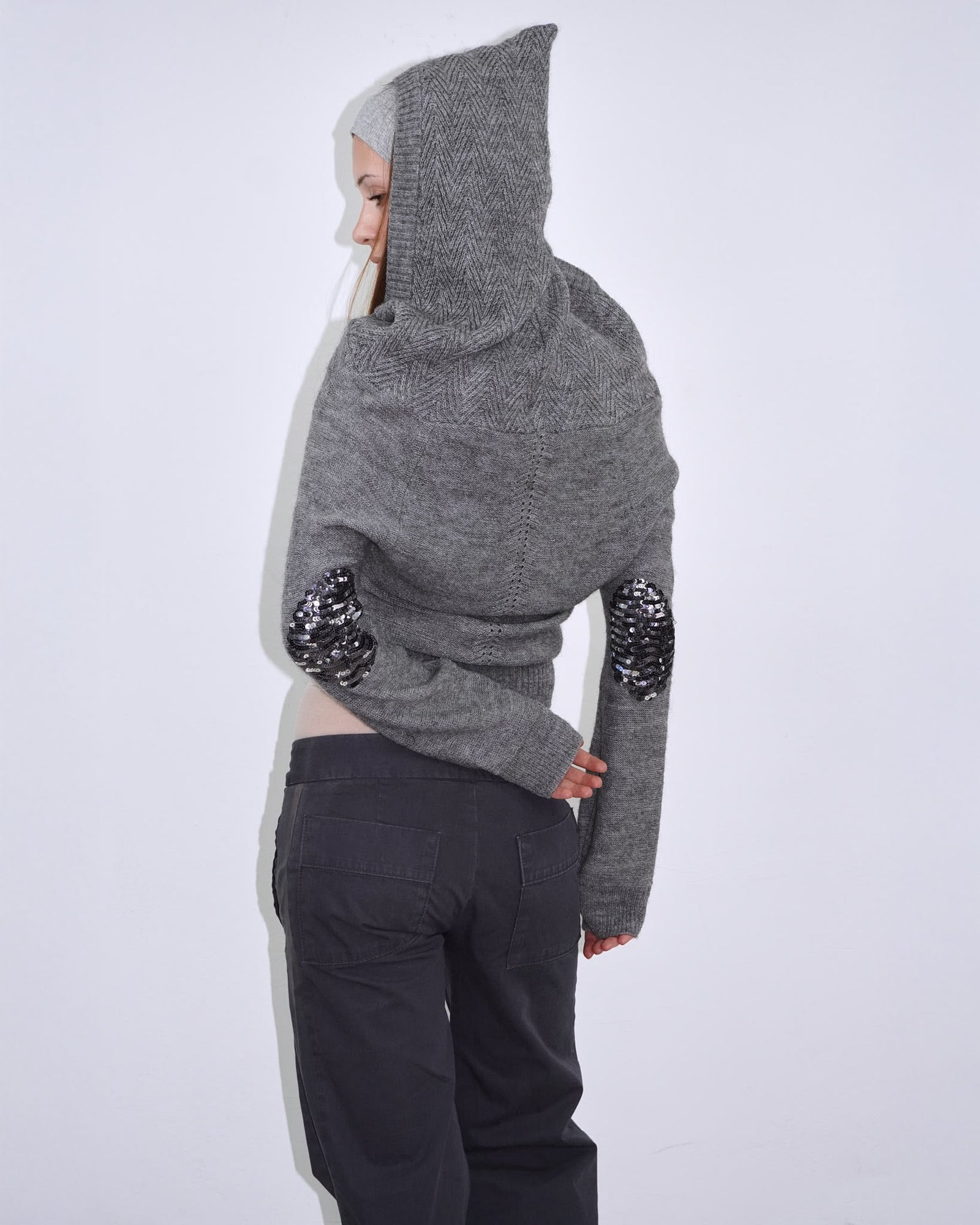 grey knit hoodie with sequins elbow patches