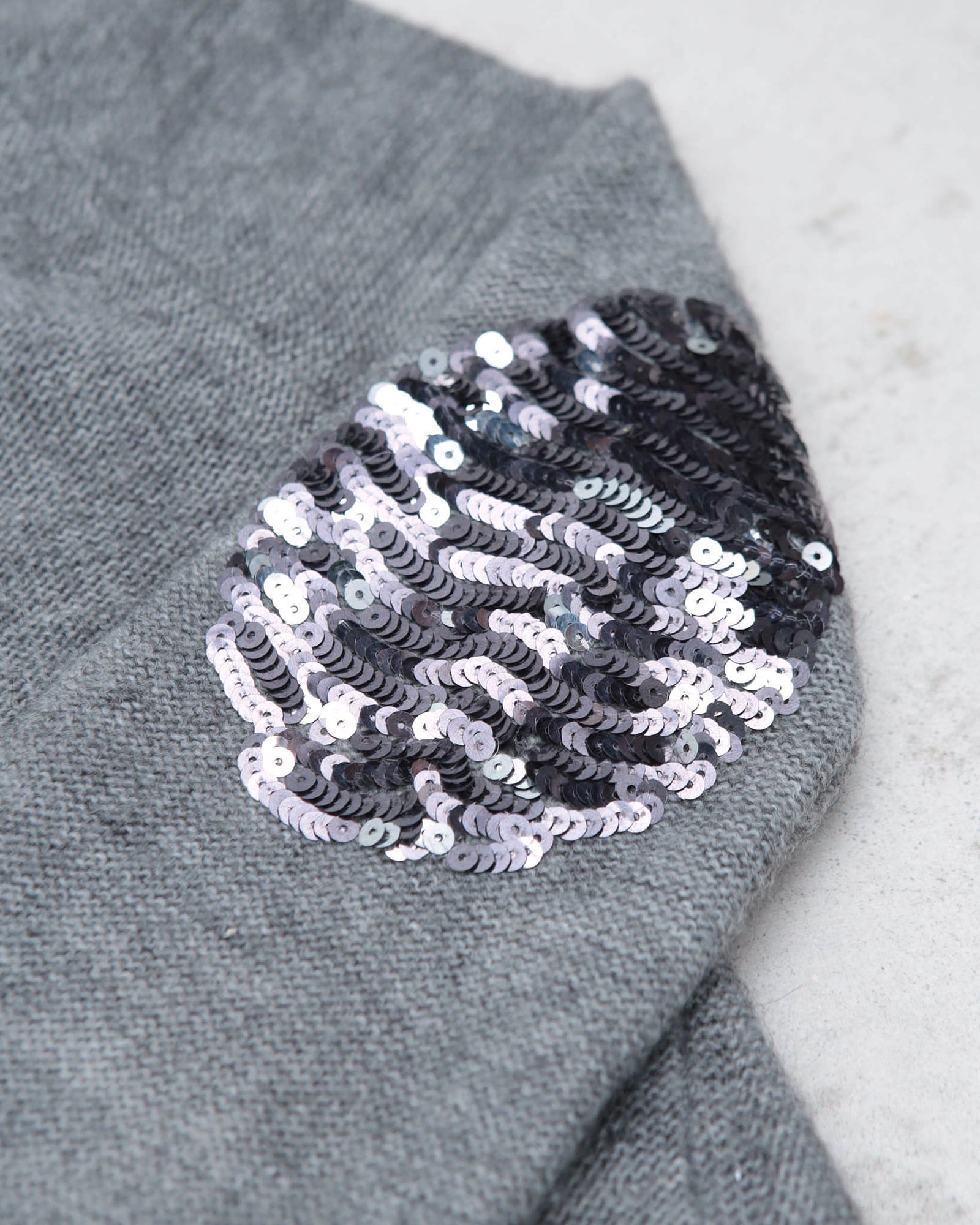 grey knit hoodie with sequins elbow patches