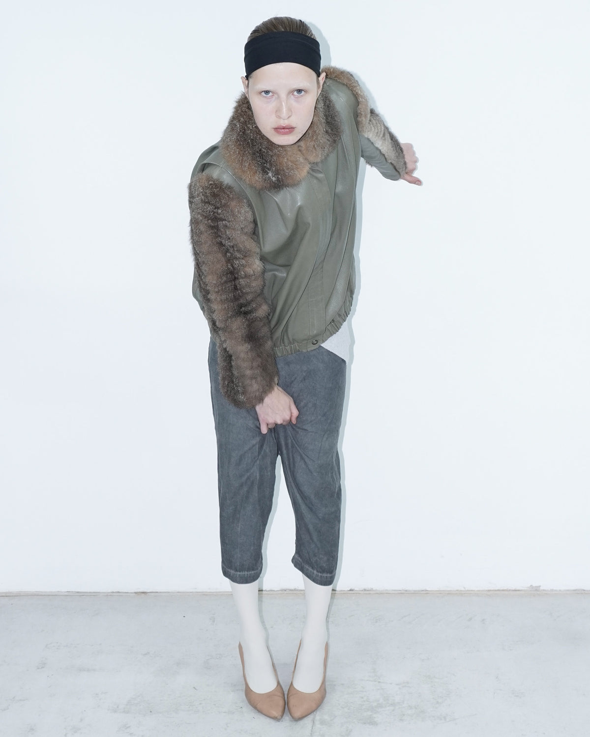 khaki leather jacket with fur sleeves and collar
