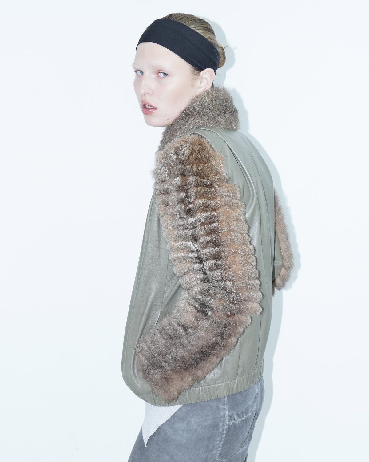 khaki leather jacket with fur sleeves and collar