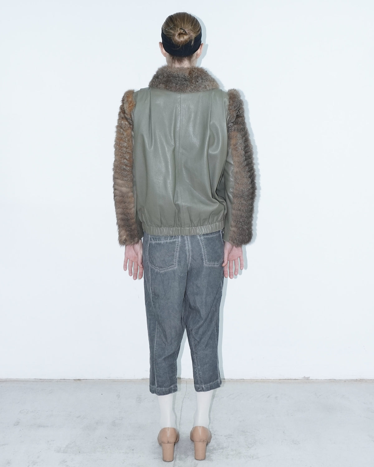 khaki leather jacket with fur sleeves and collar