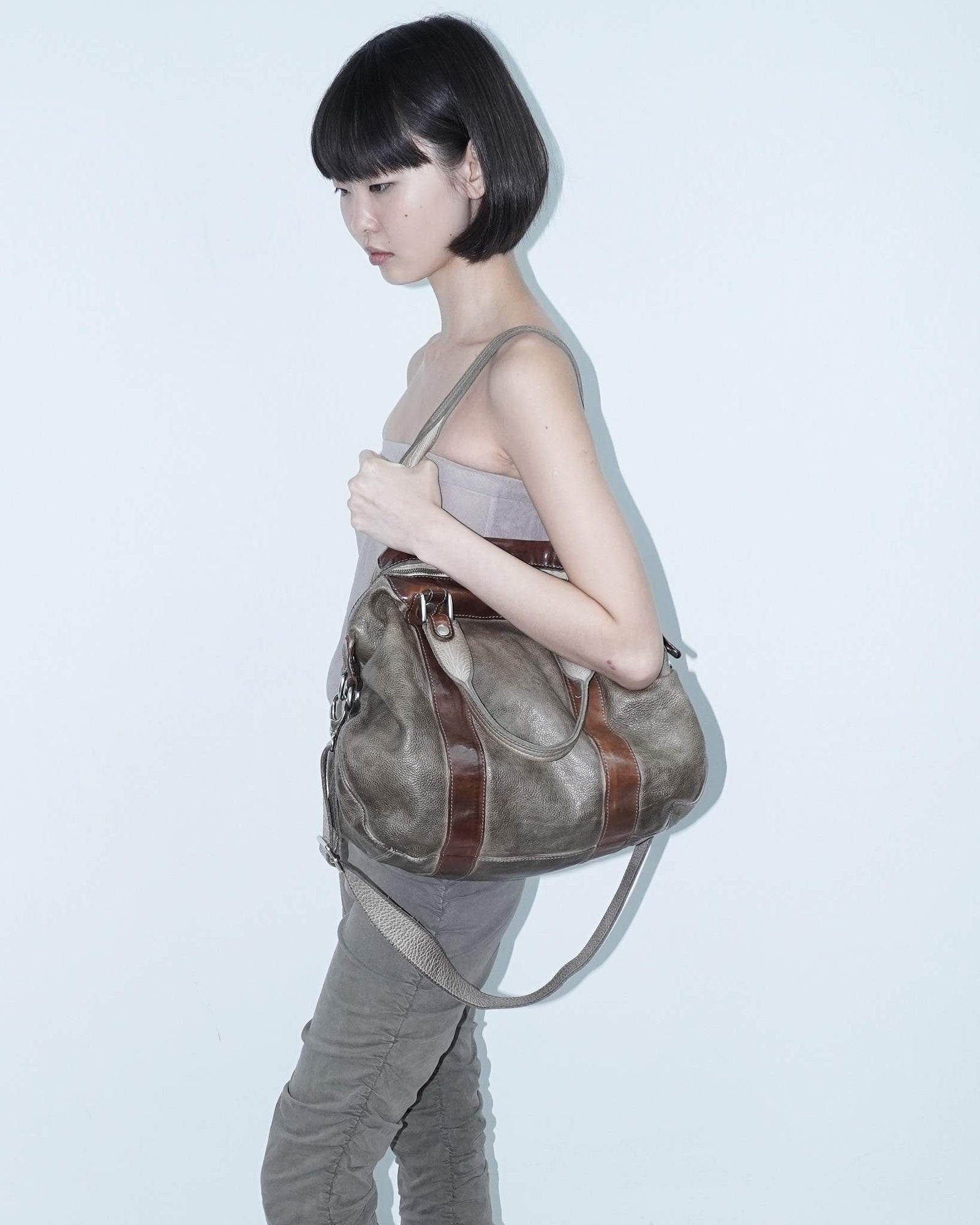 medium brown multi textured leather bag