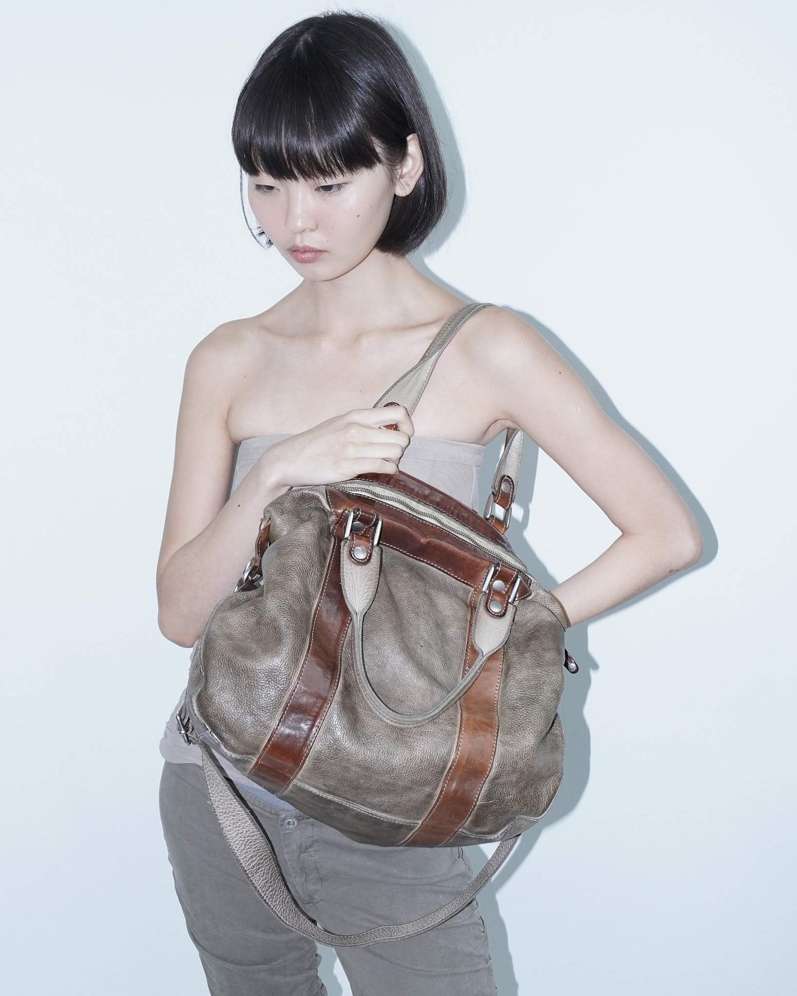 medium brown multi textured leather bag