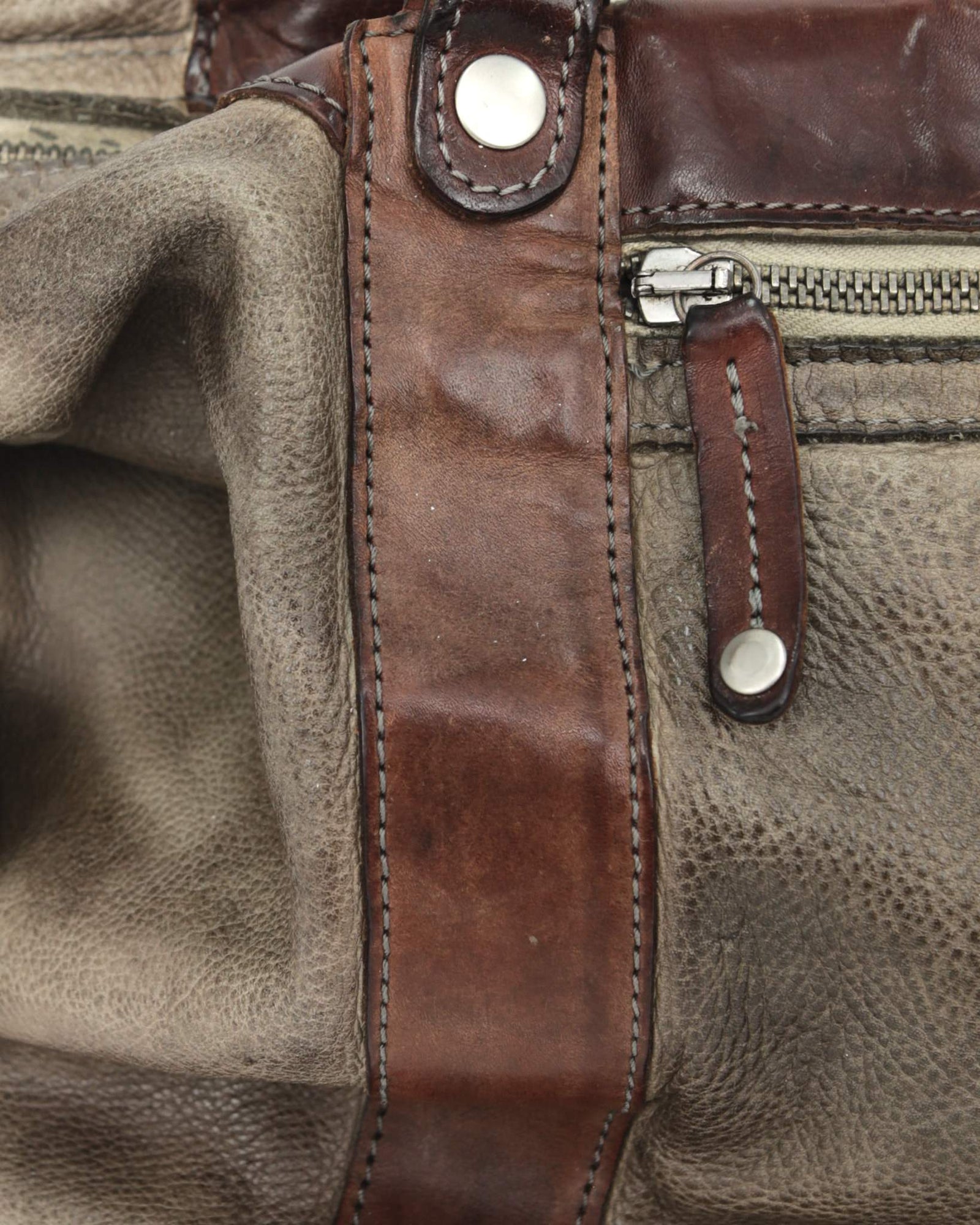 medium brown multi textured leather bag