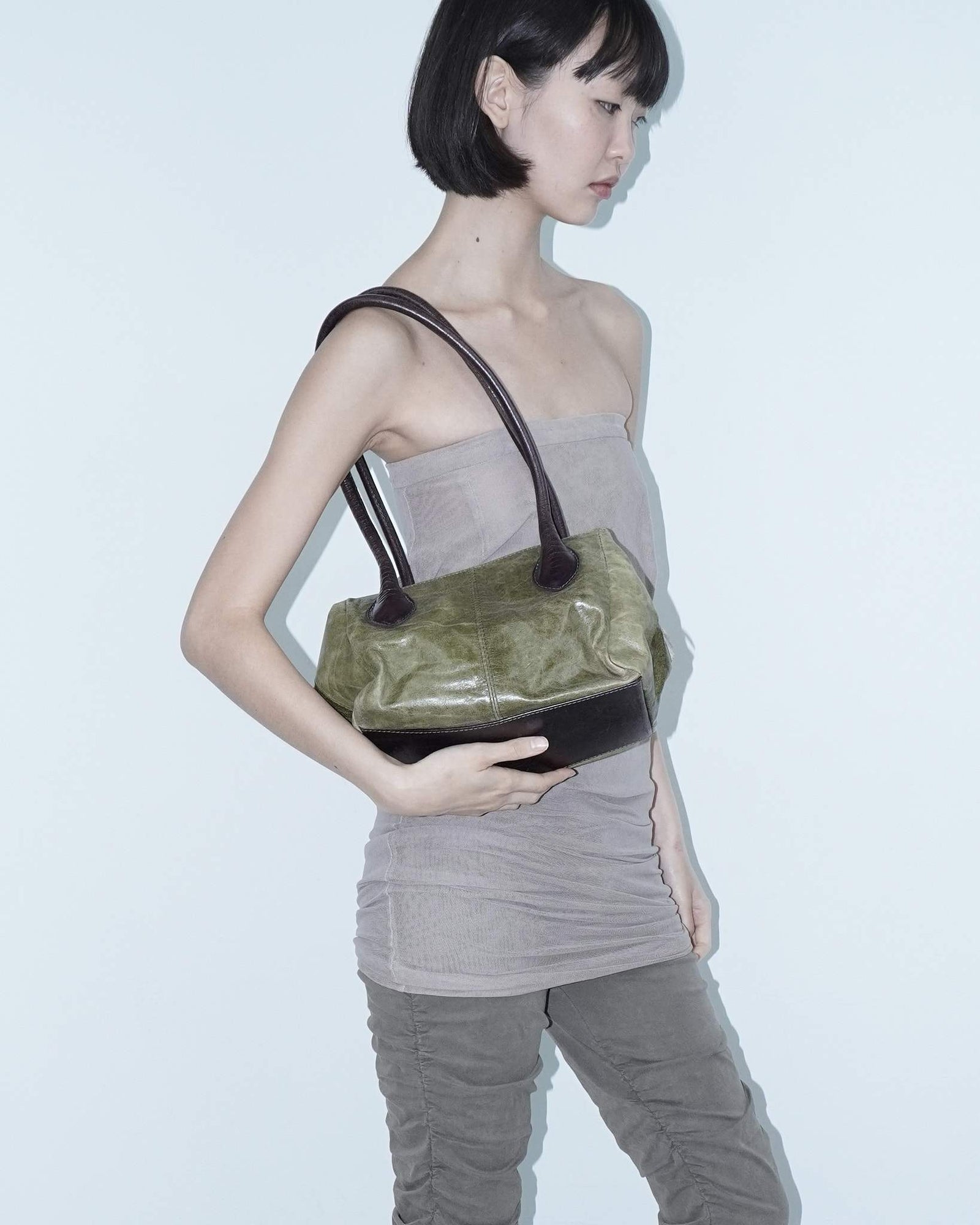 medium sage green and aubergine leather bag