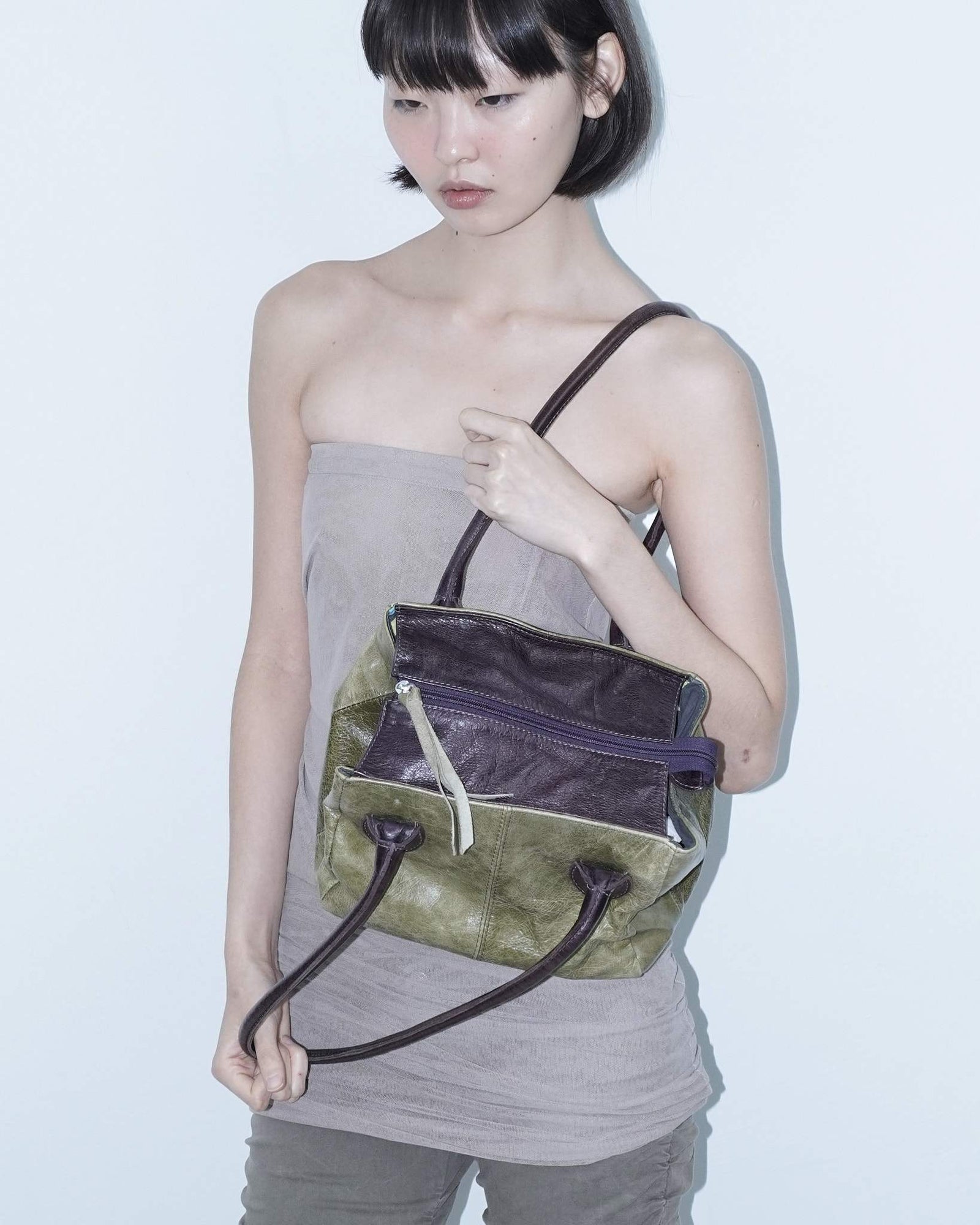 medium sage green and aubergine leather bag