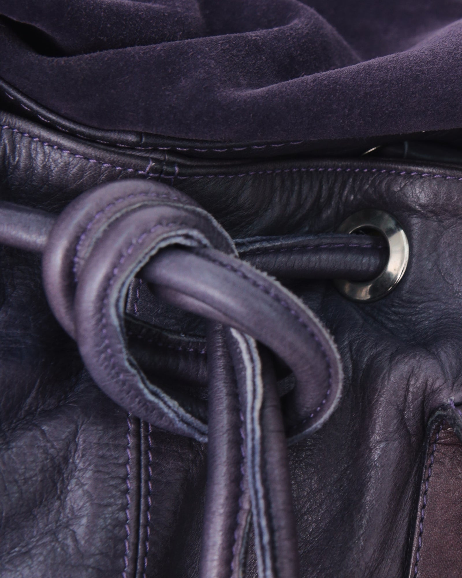 medium washed purple leather bag