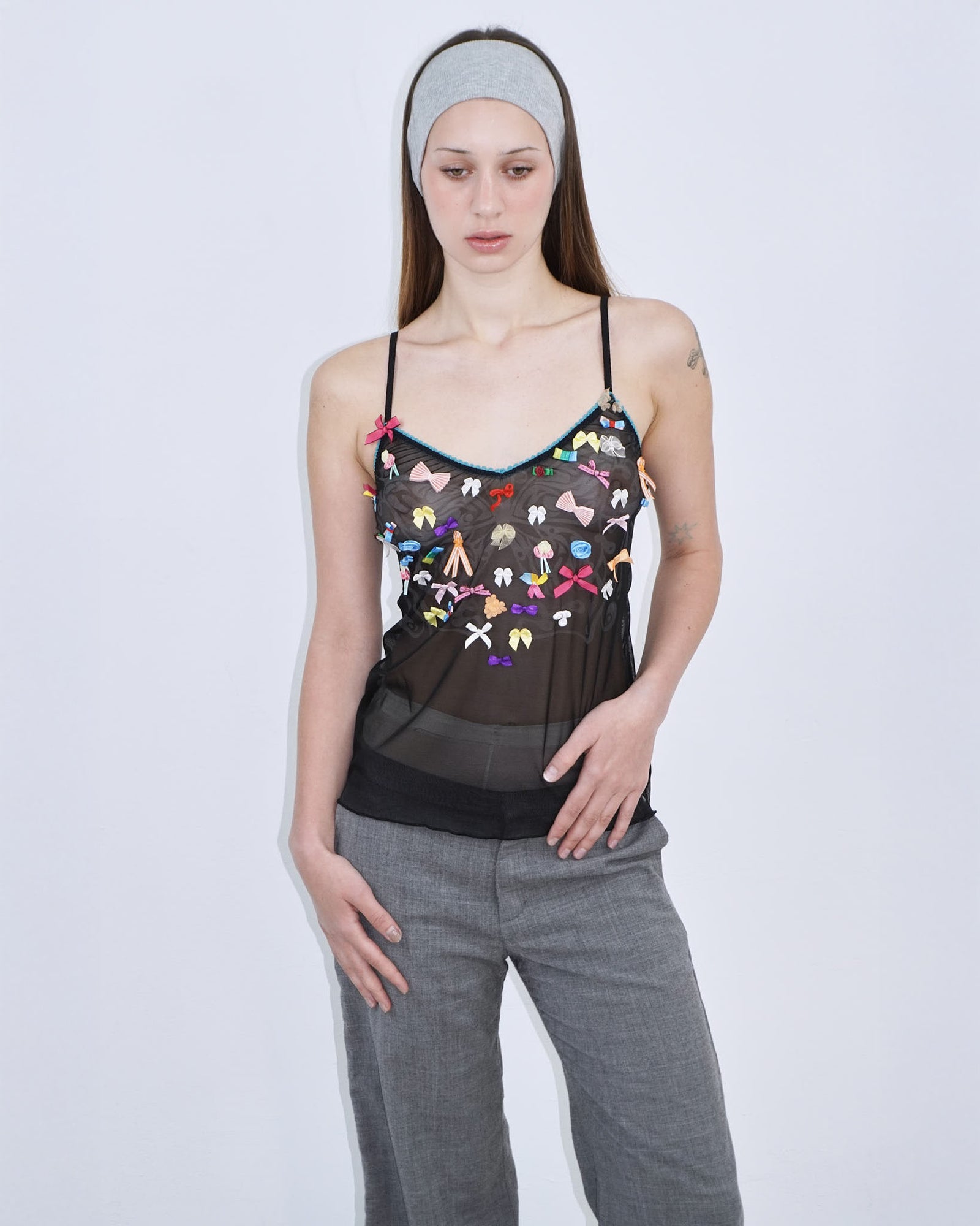 mesh top with colourful bows and butterfly print